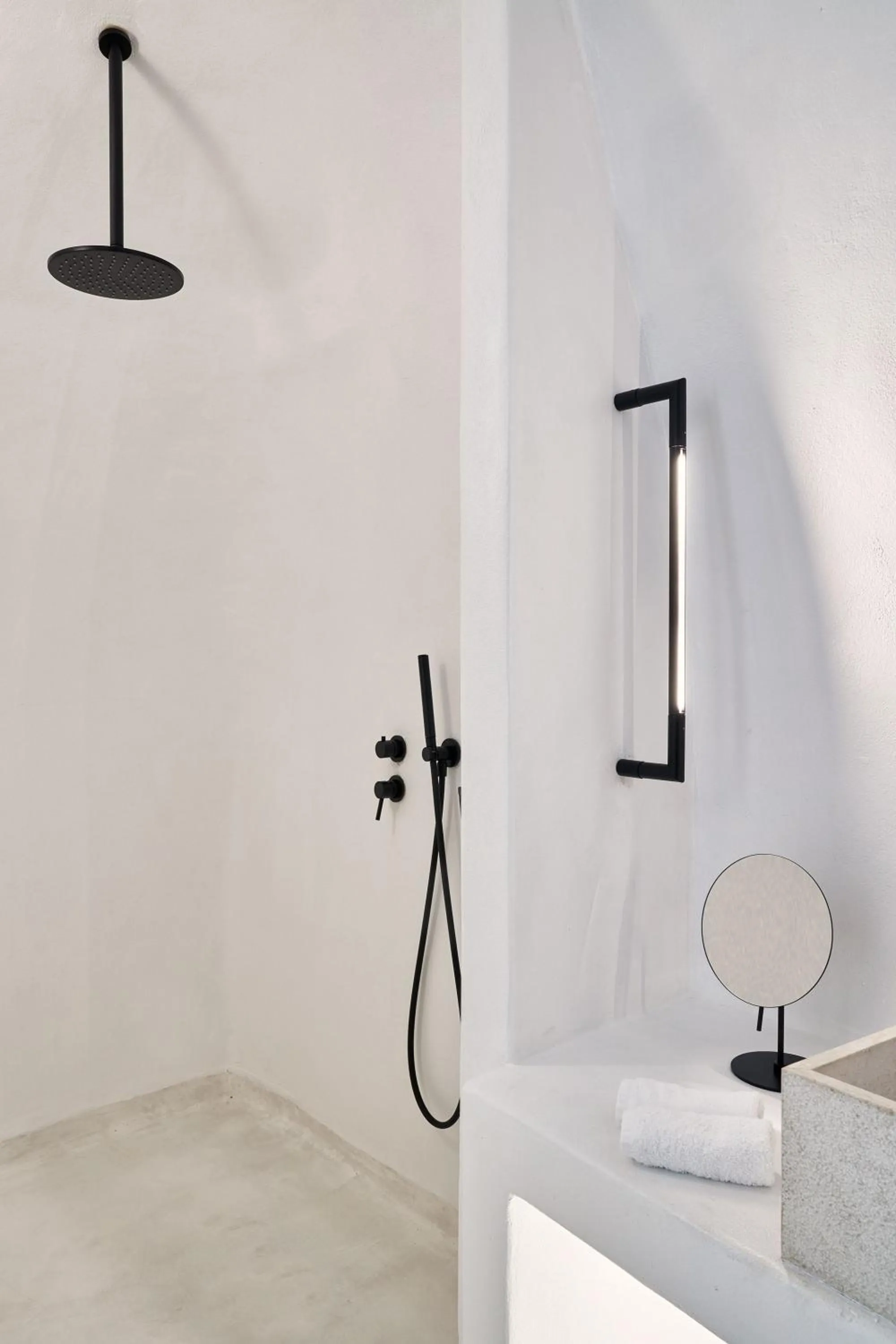 Shower in Charisma Suites