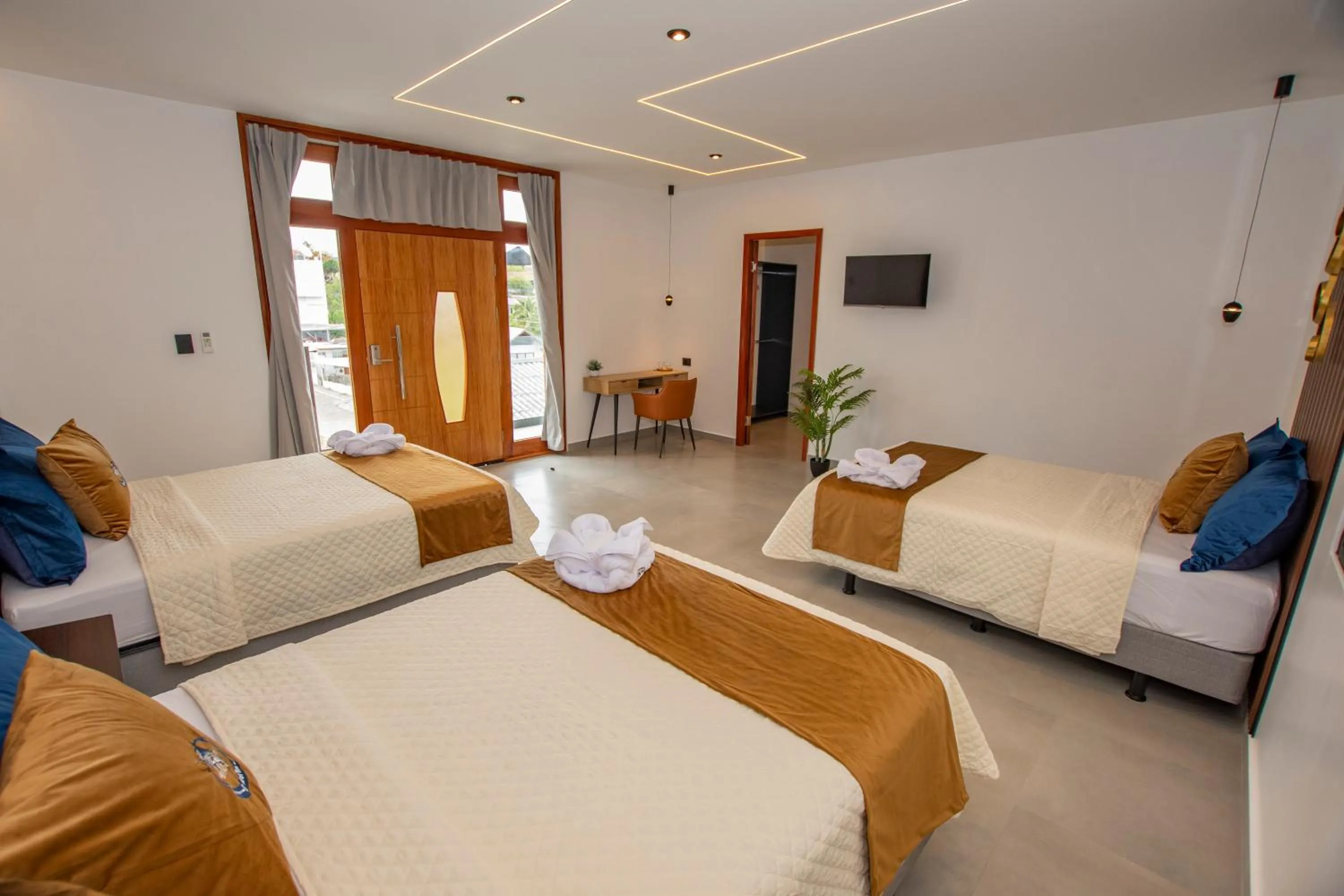 Bed in Blue Marlin Galápagos, Hotel & SPA