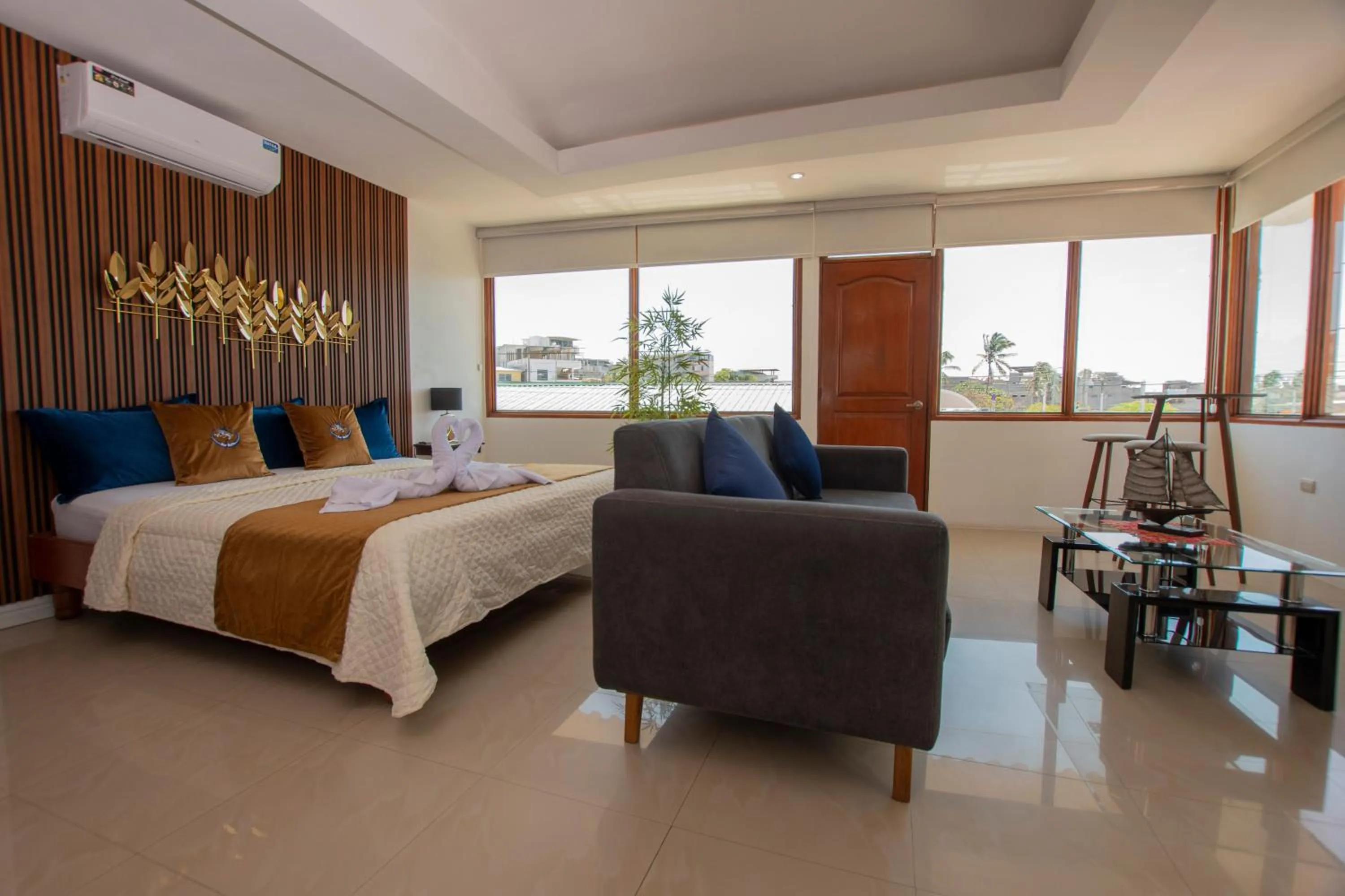 Bed in Blue Marlin Galápagos, Hotel & SPA