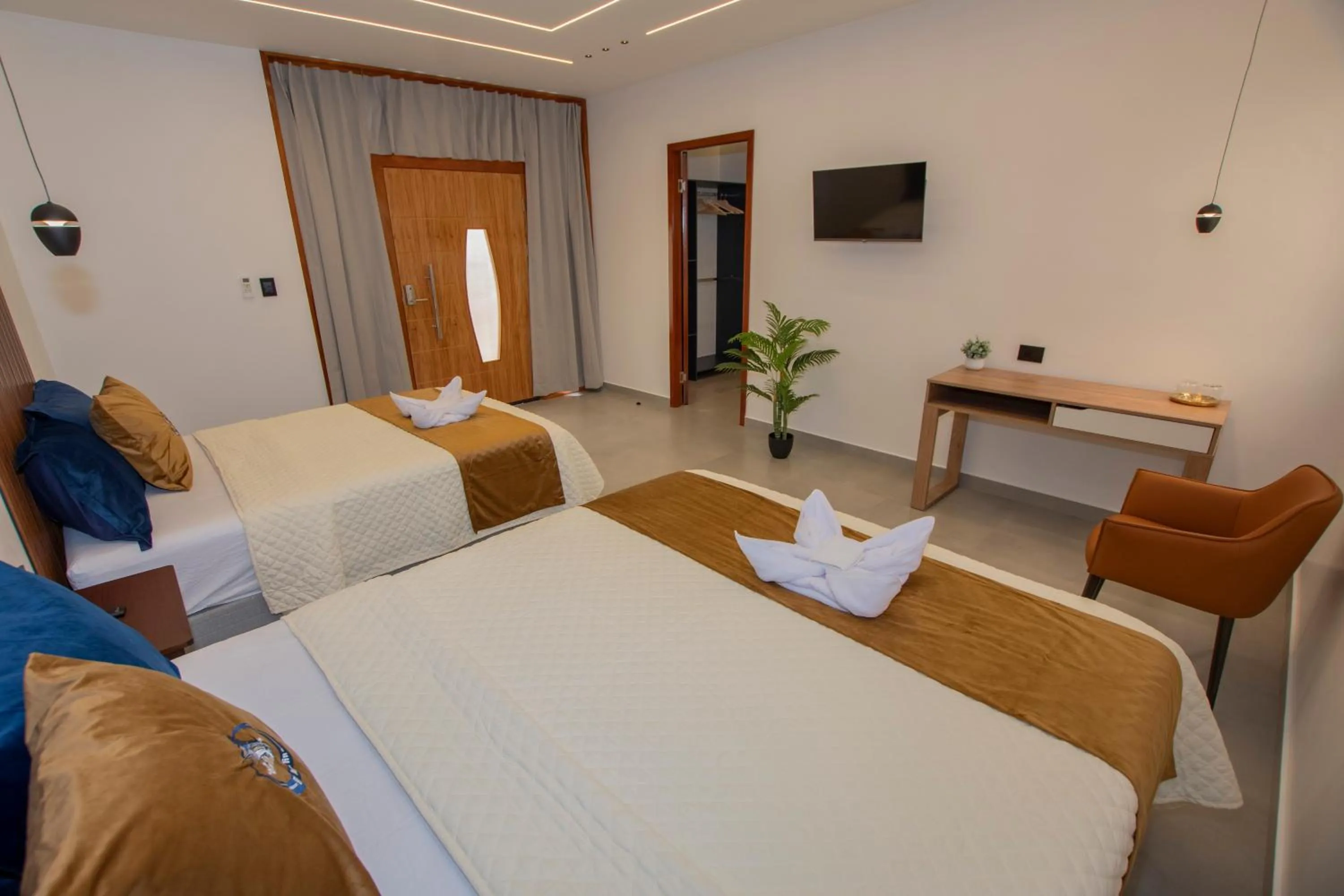 Bed in Blue Marlin Galápagos, Hotel & SPA