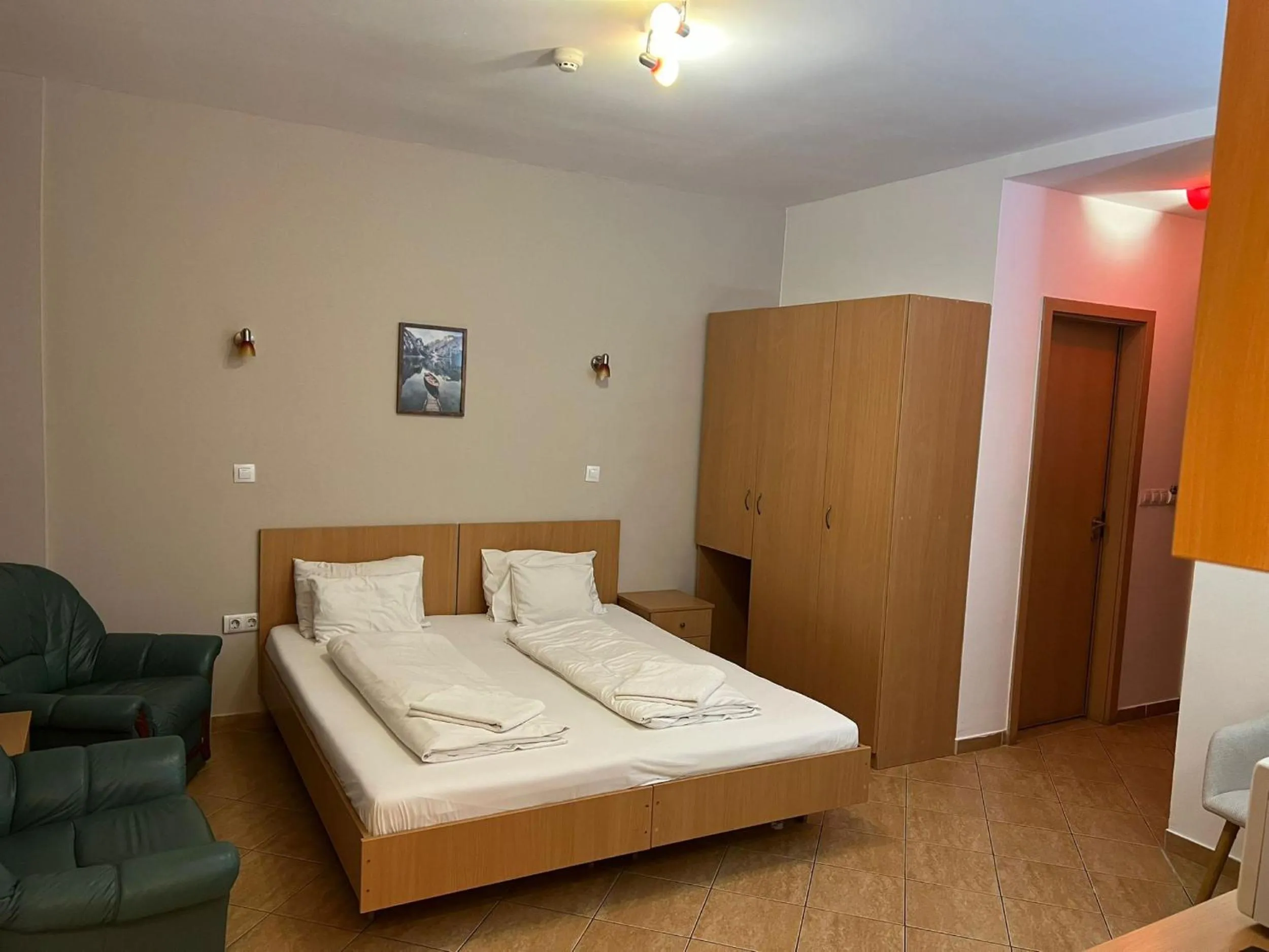 Seating area, Bed in Esprit Hotel