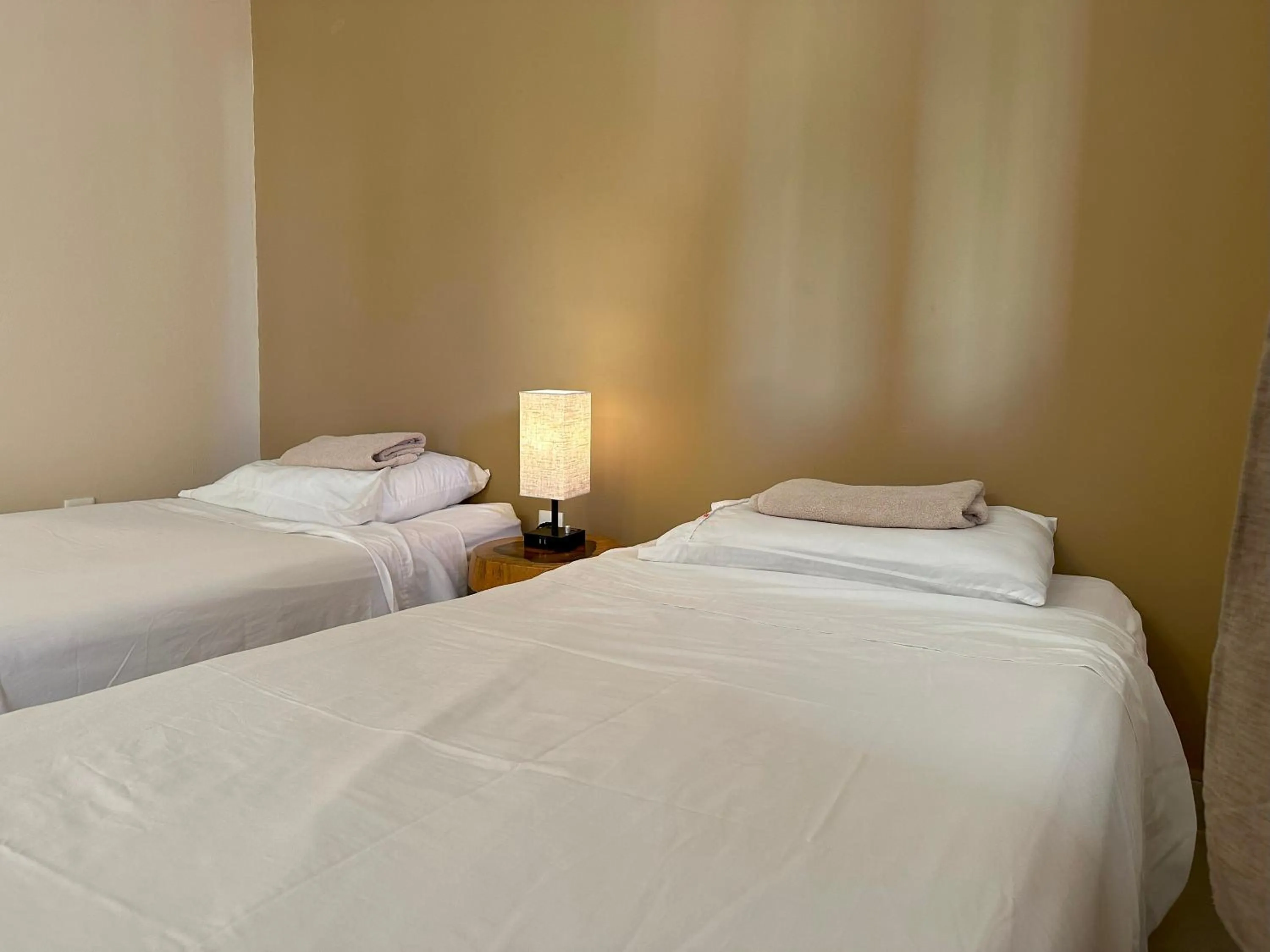 Bed in Pachamaya Holistic Wellness & Spa