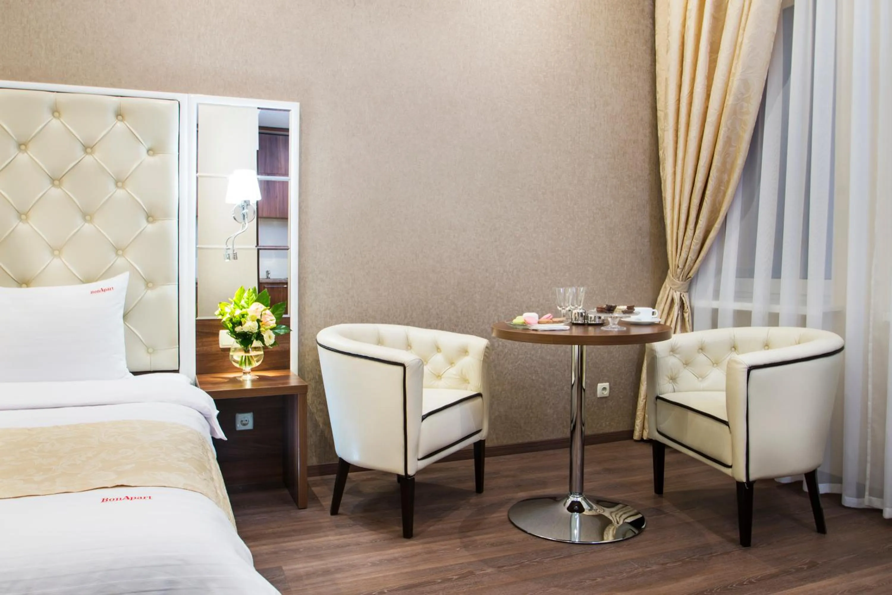 Seating area, Bed in BonApart Hotel by UHM