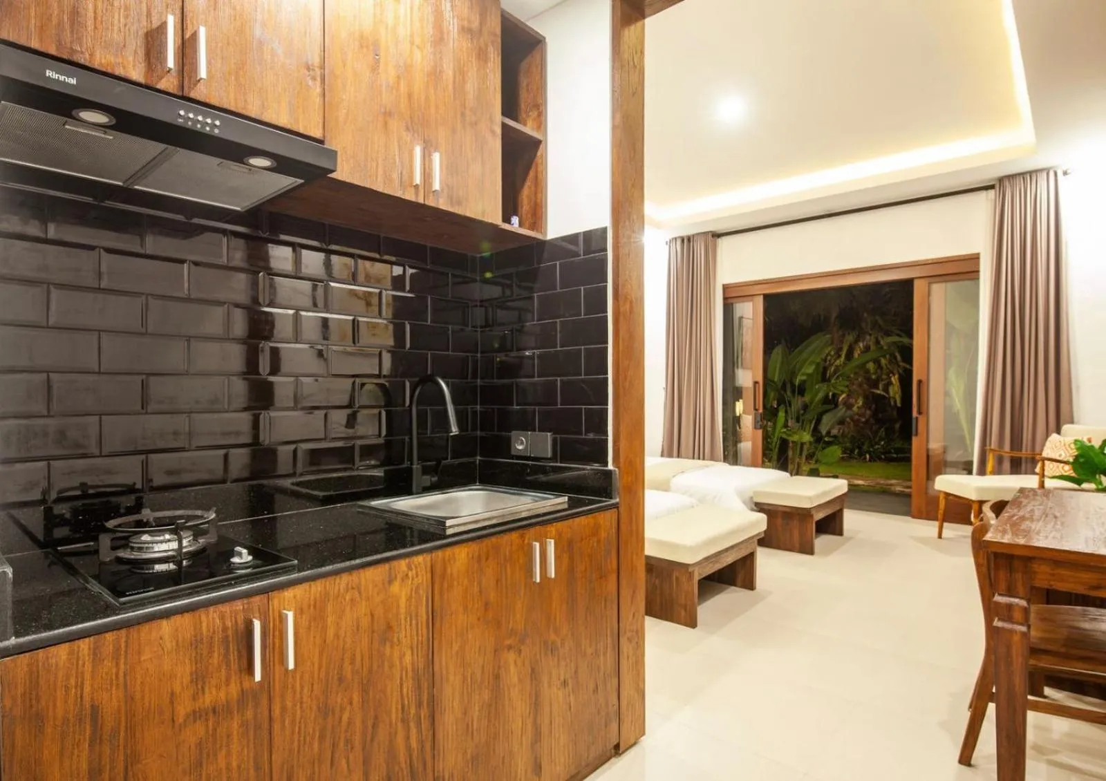 Kitchen or kitchenette in Griya Shanti Suites