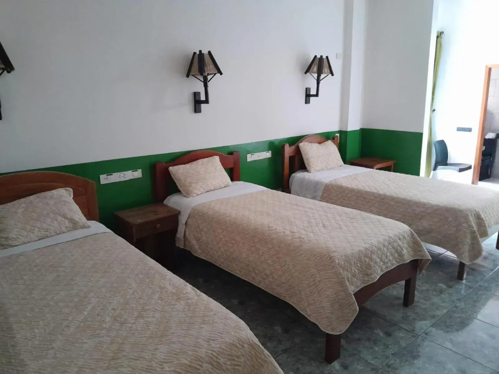 Triple Room with View in Hostal Limoncocha Triple Room with View in Hostal Limoncocha