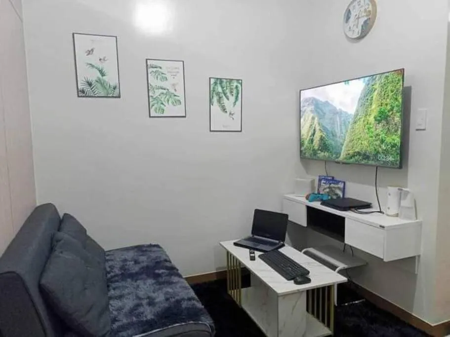 Living room in Chelsea Suite's Esthetic Staycation at Trees Residence QC