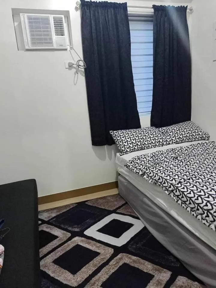 Bed in Chelsea Suite's Esthetic Staycation at Trees Residence QC