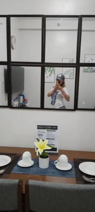 Dining area in Chelsea Suite's Esthetic Staycation at Trees Residence QC