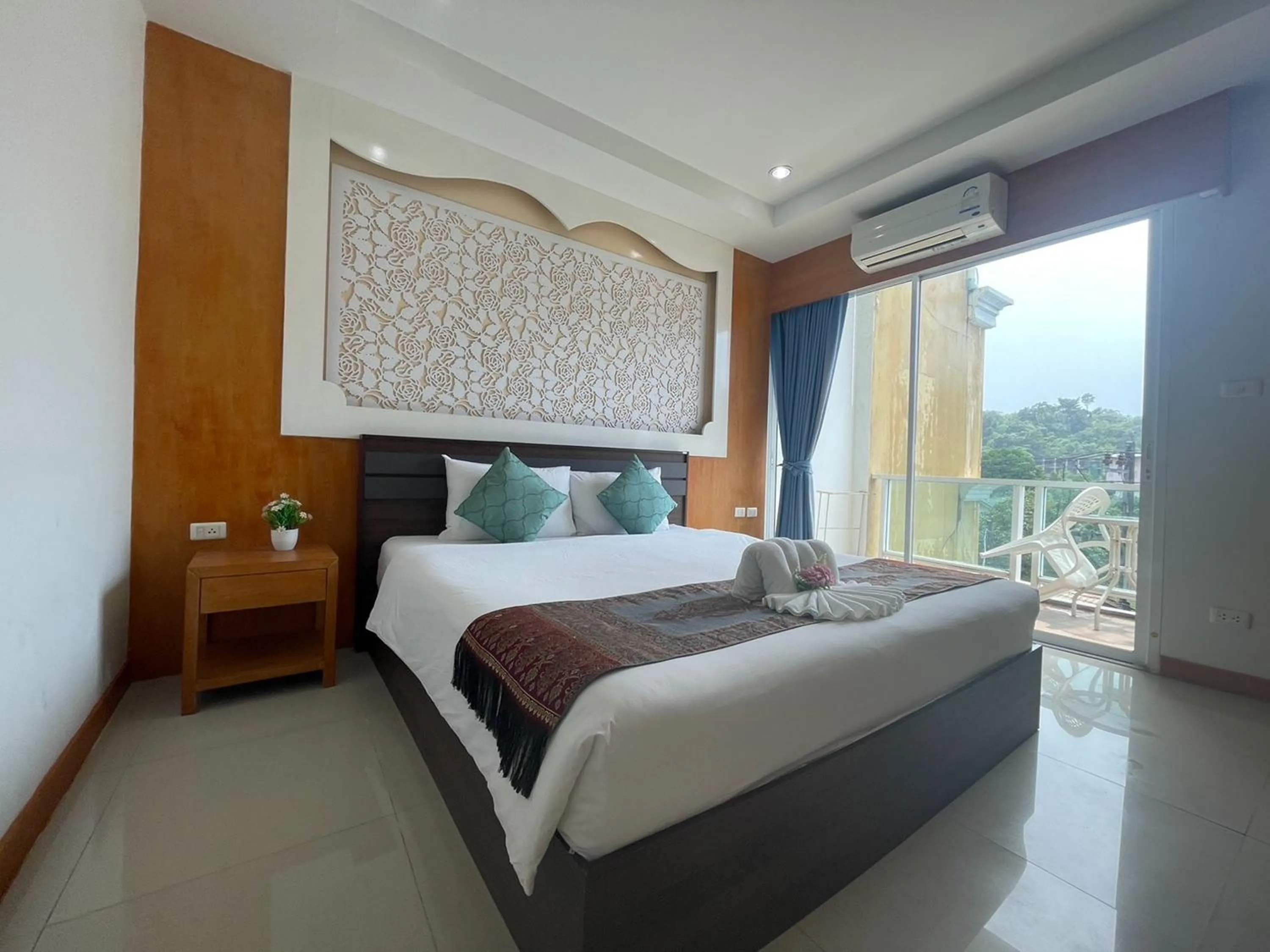 Bedroom, Bed in T & C Hotel Patong Beach