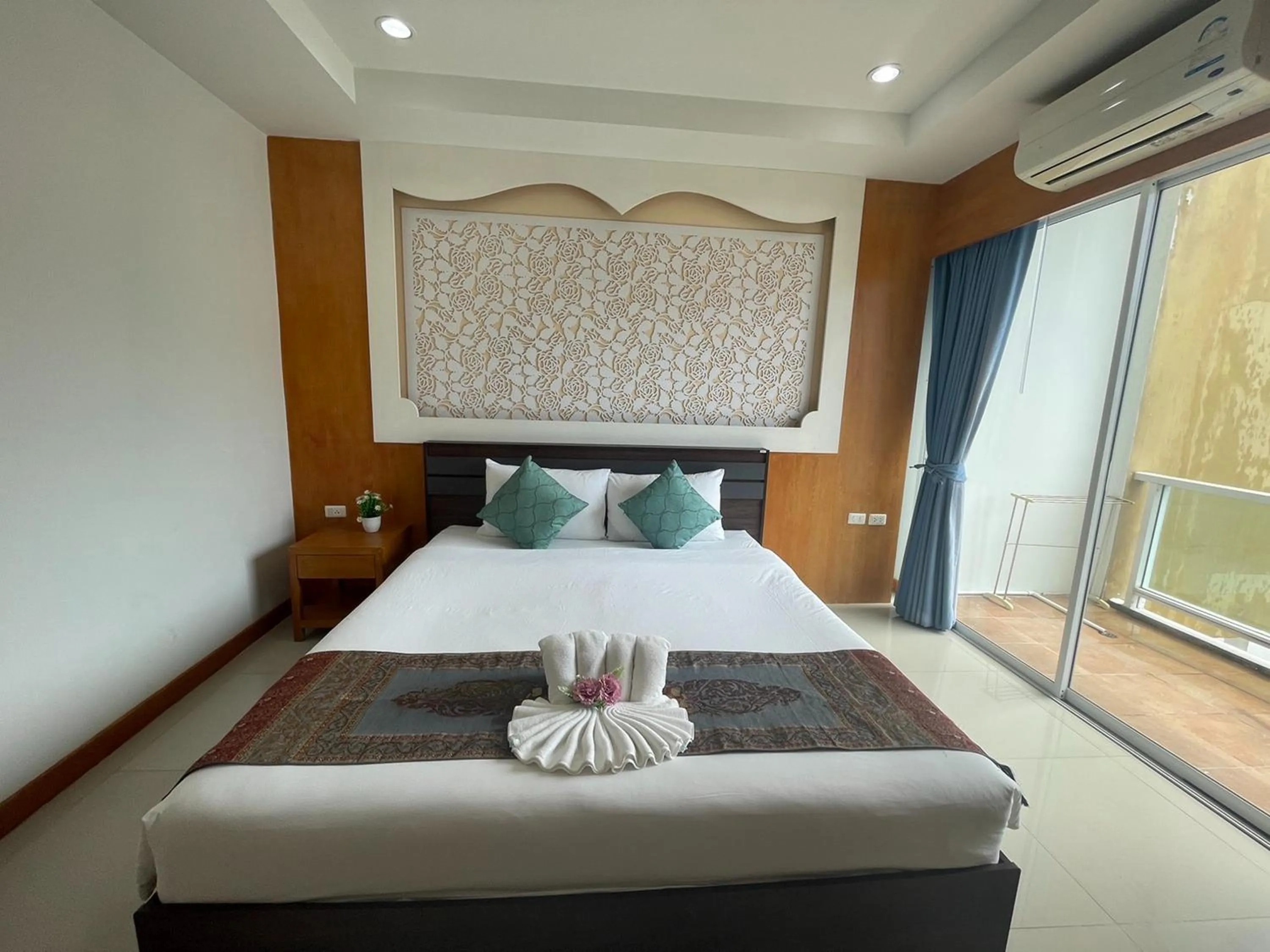 Bedroom, Bed in T & C Hotel Patong Beach