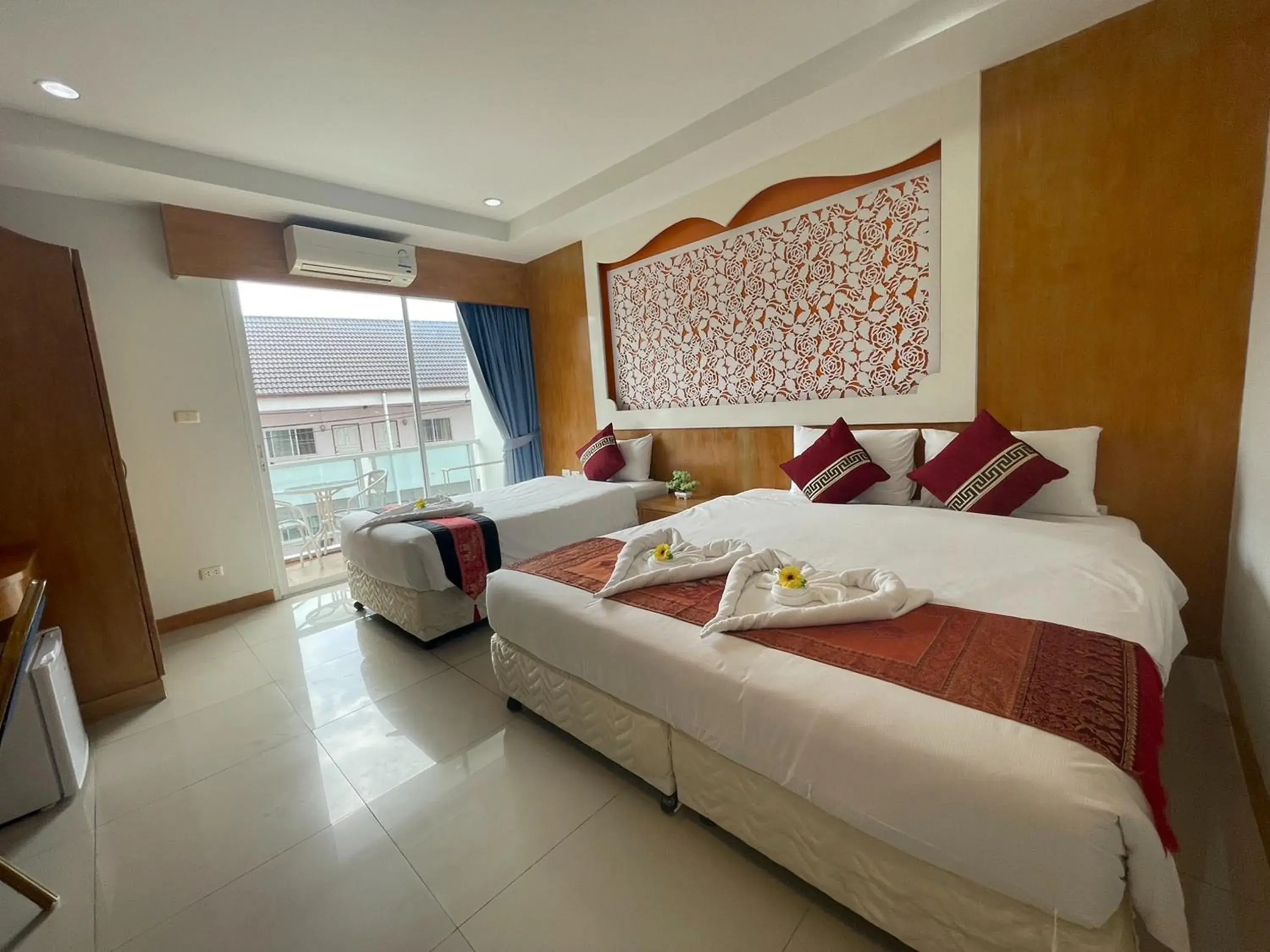 Triple Room with Balcony in T & C Hotel Patong Beach Triple Room with Balcony in T & C Hotel Patong Beach