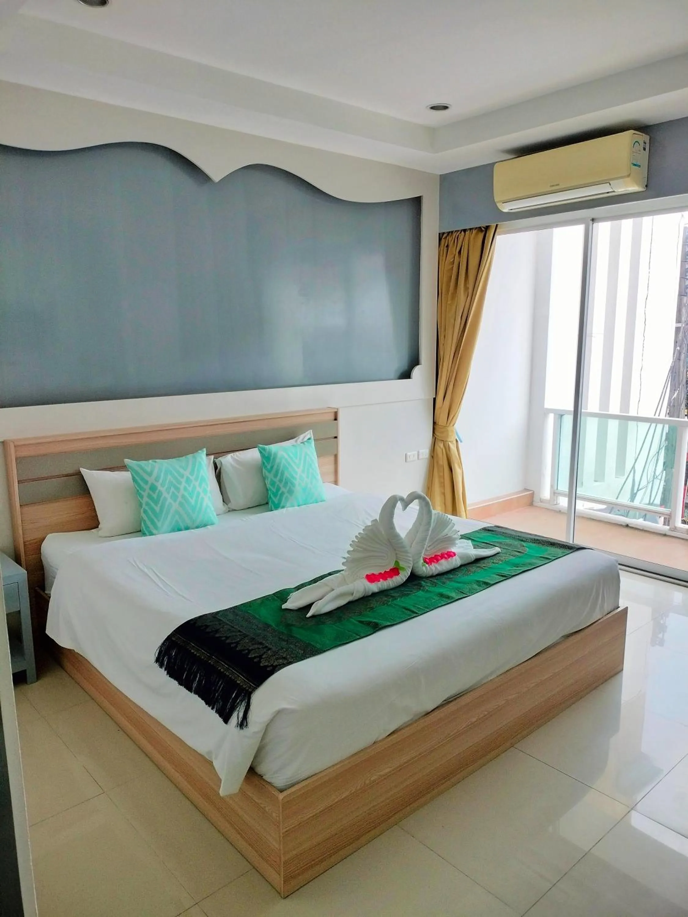 Bedroom, Bed in T & C Hotel Patong Beach