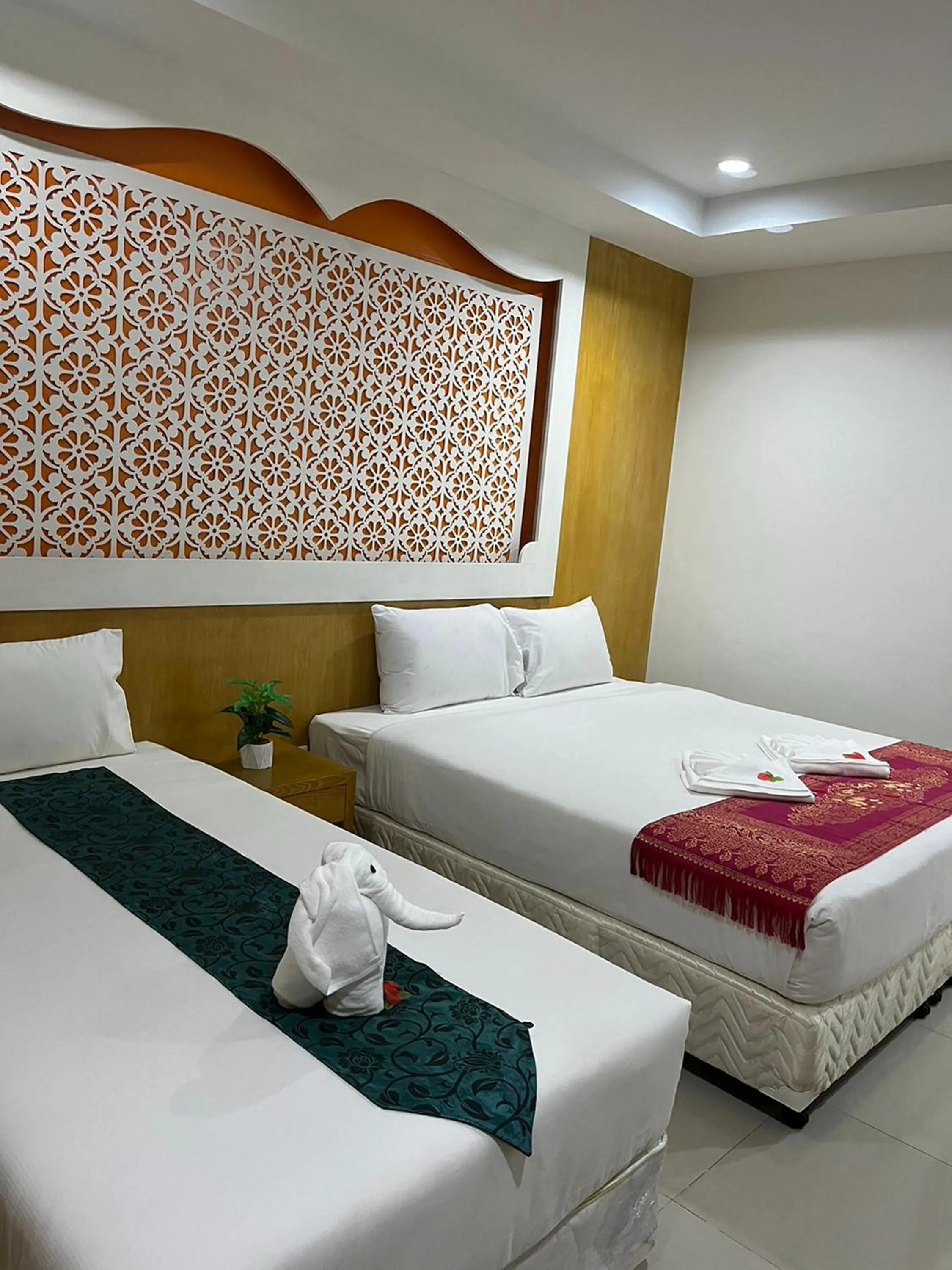 Bedroom, Bed in T & C Hotel Patong Beach