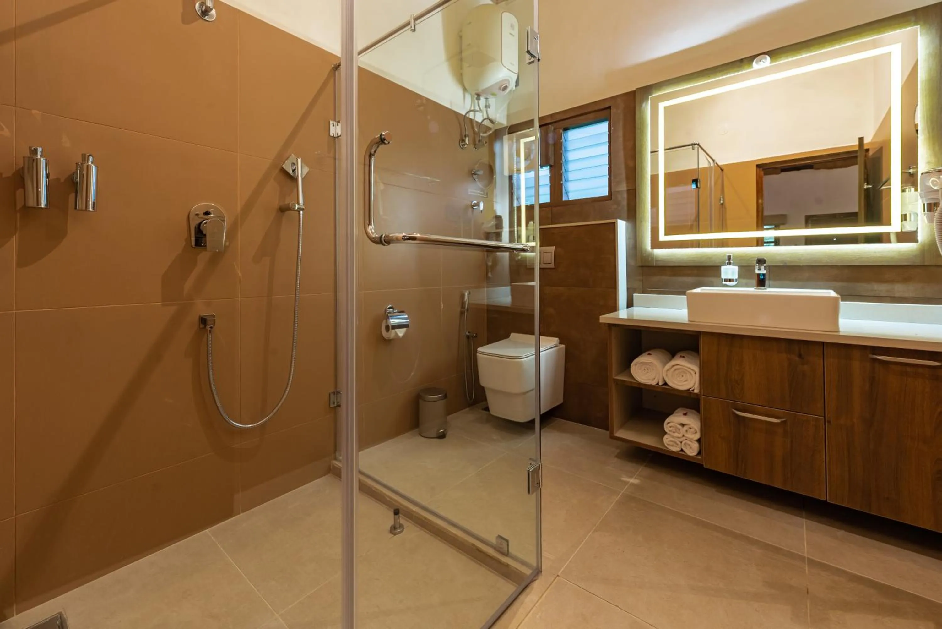 Shower in Shanthi Kunnj Riverside Exotica Chikmagalur