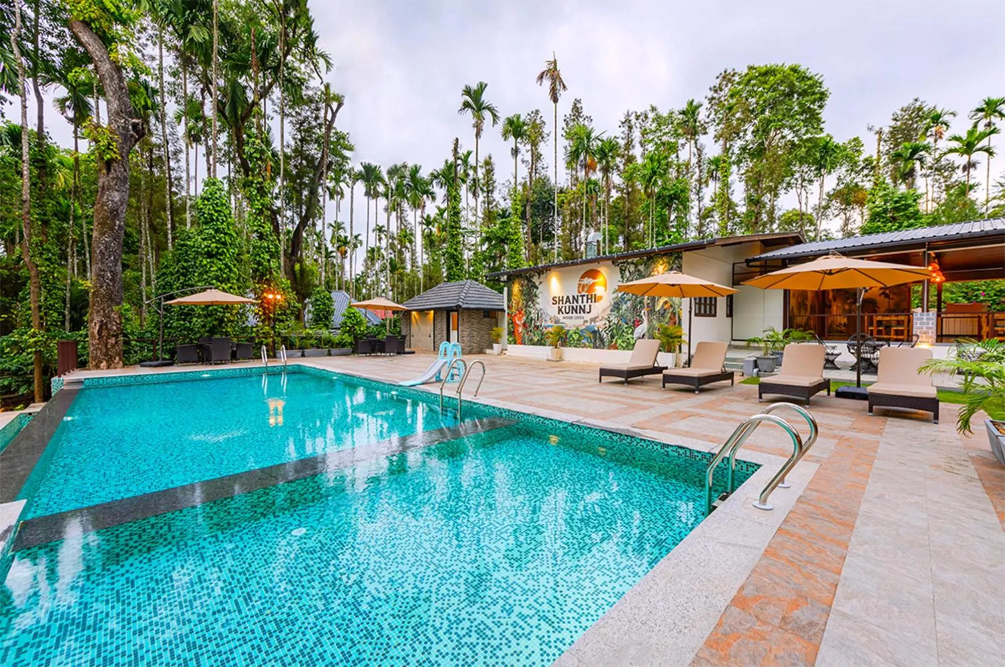 Garden view in Shanthi Kunnj Riverside Exotica Chikmagalur