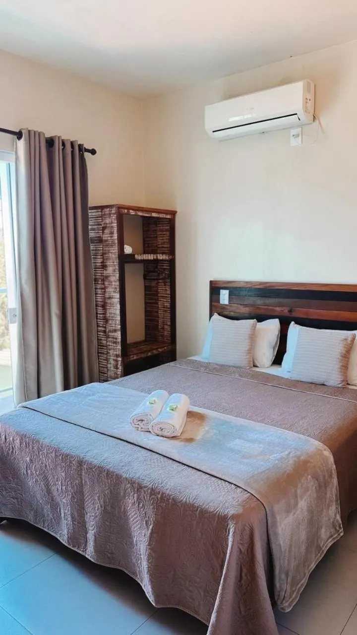 Bed in Pousada Paraíso Tropical