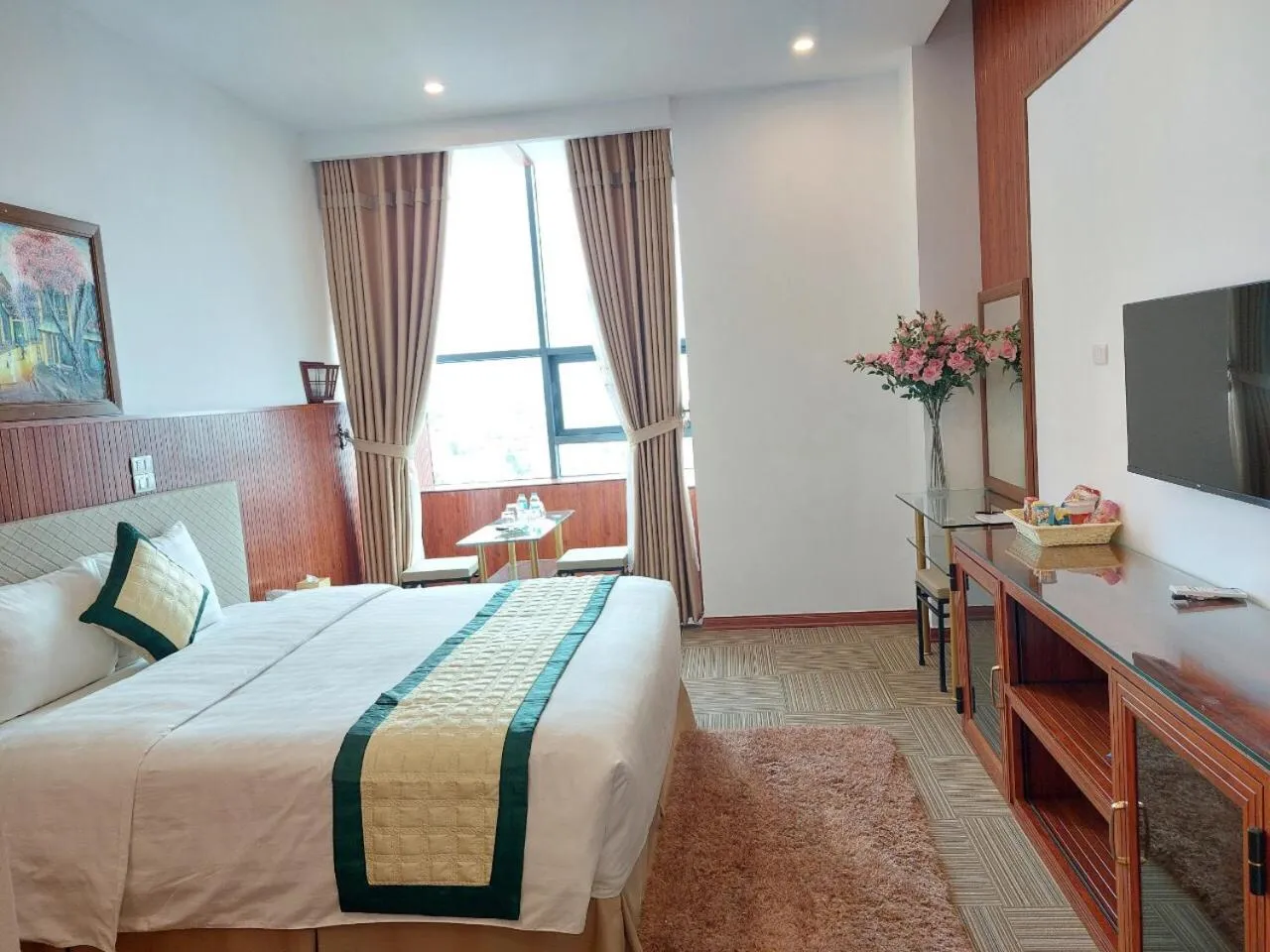 Communal lounge/ TV room, Bed in Bình An Nhiên hotel