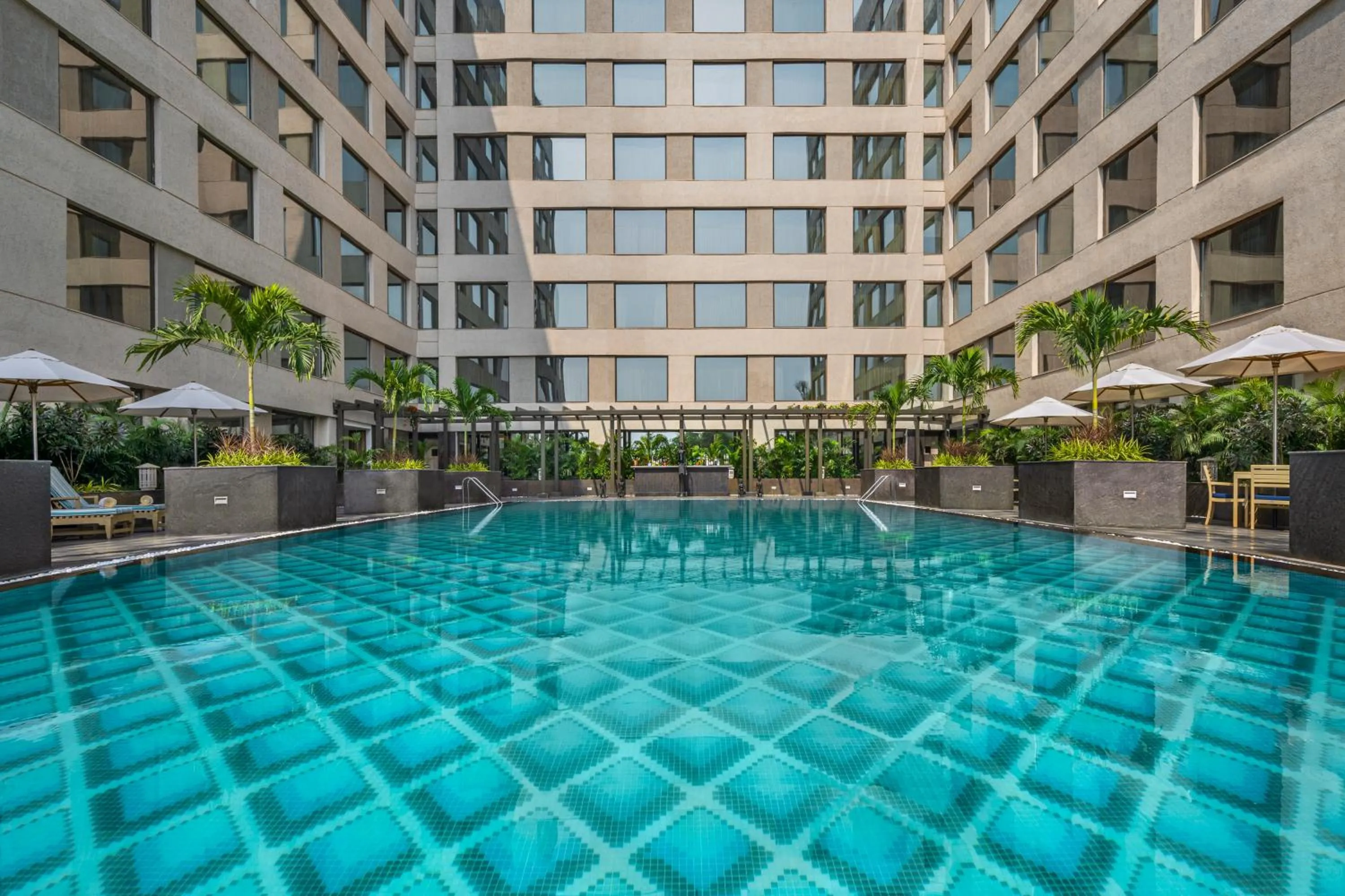Swimming pool in Aurika, Mumbai International Airport - Luxury by Lemon Tree Hotels