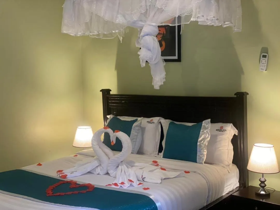 Bed in BWIRANDA HOTEL