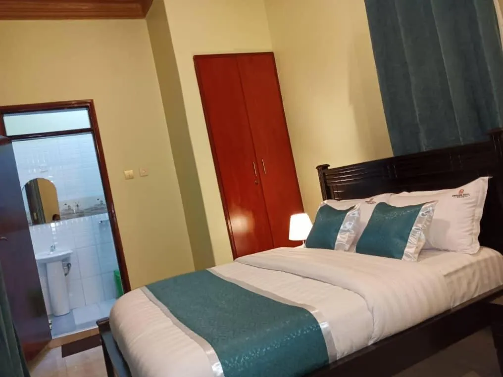 Bed in BWIRANDA HOTEL