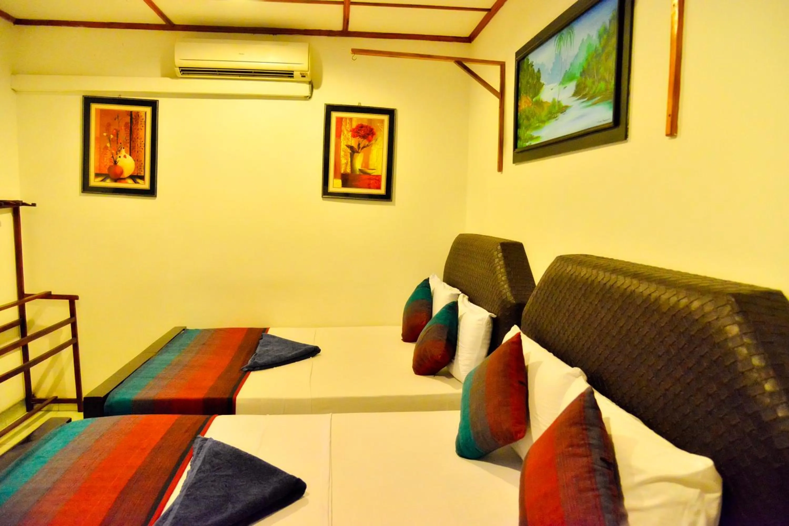 Bedroom in Thilaka City Hotel