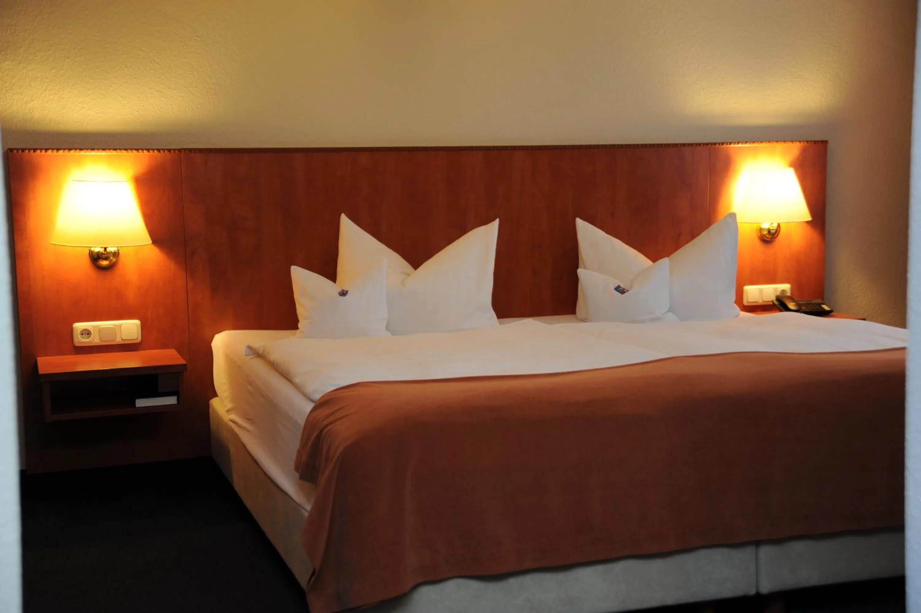 Bed in Hotel Rheinischer Hof