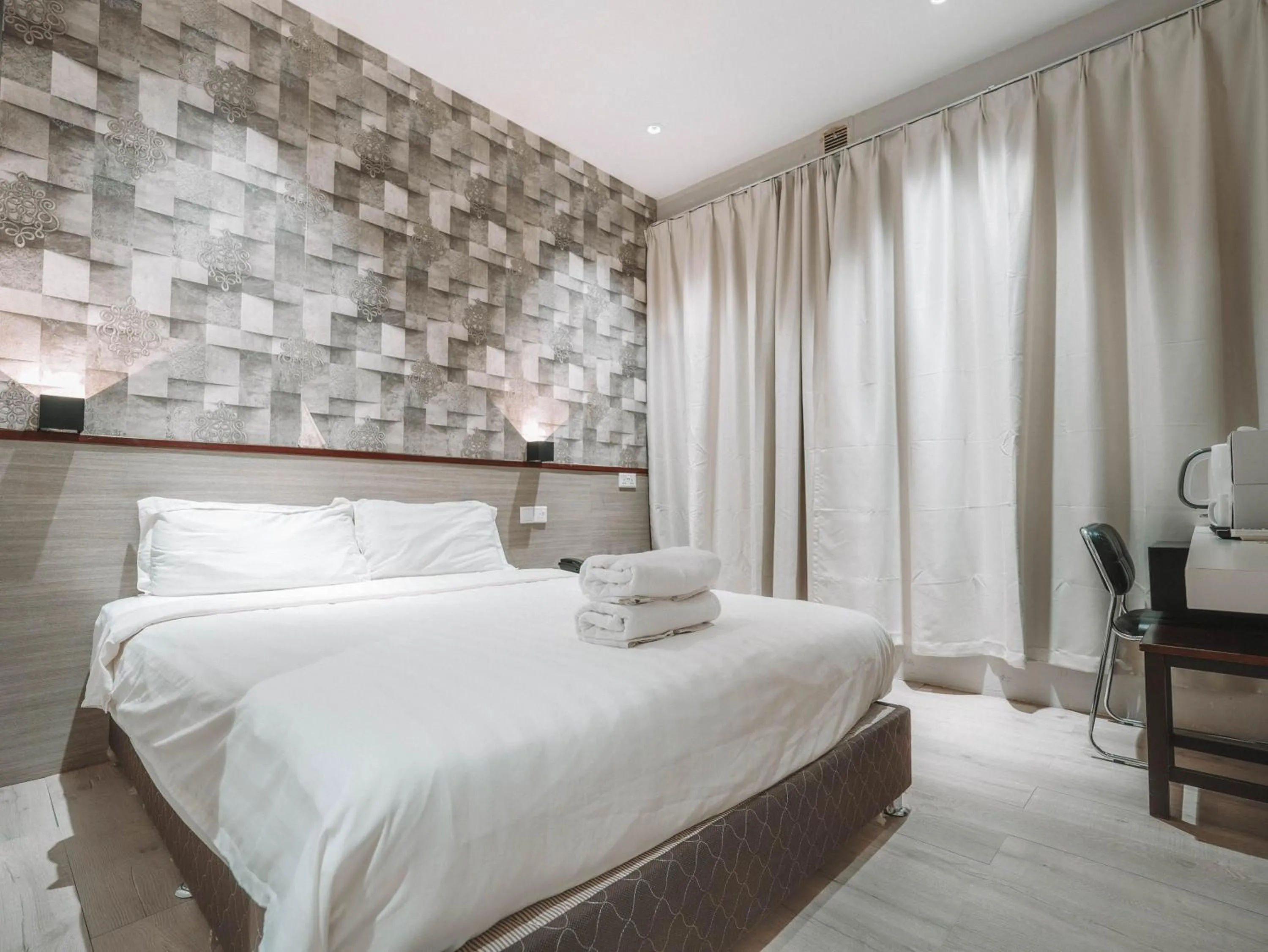 Bed in The Noble Hotel