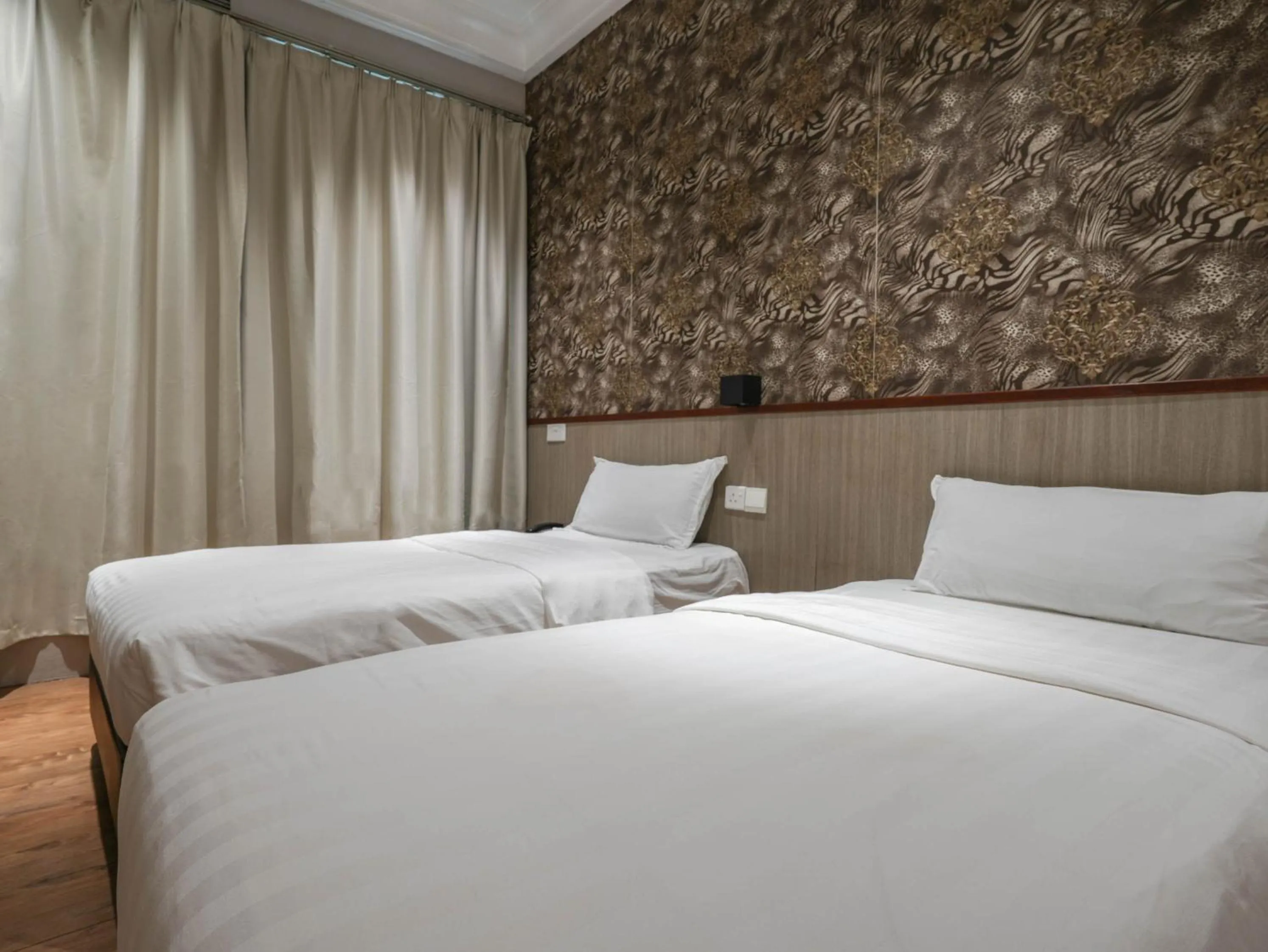 Bed in The Noble Hotel