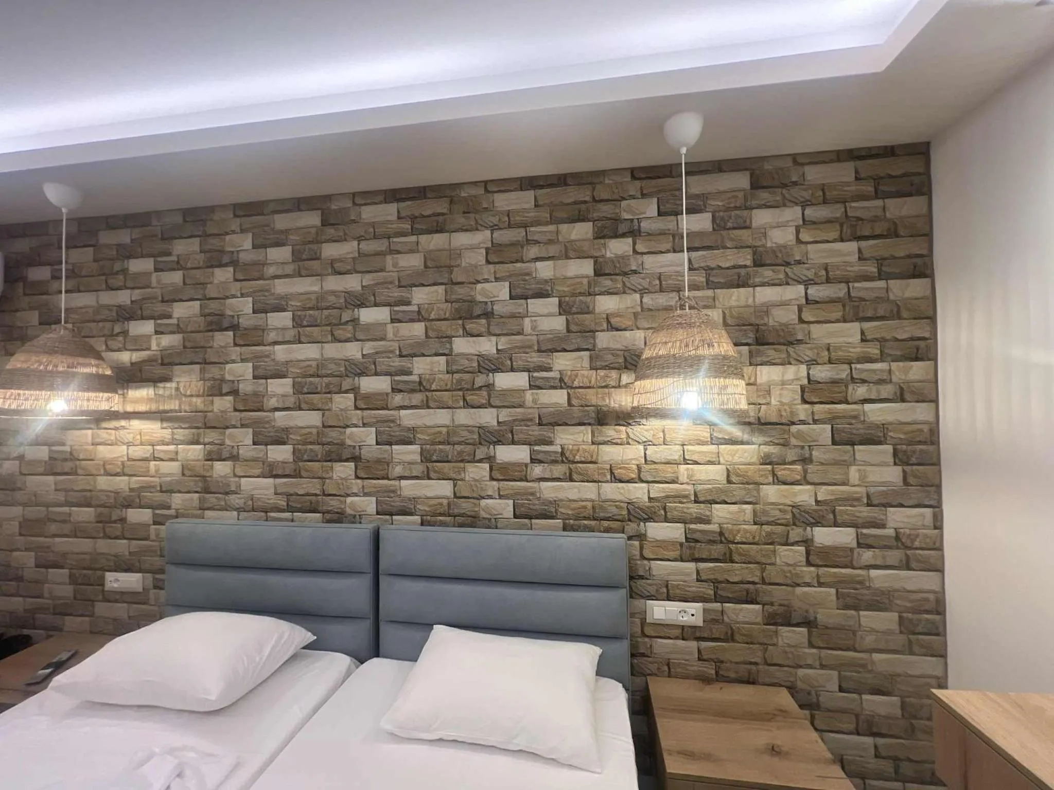 Bed in Dolphin Hotel Apartments