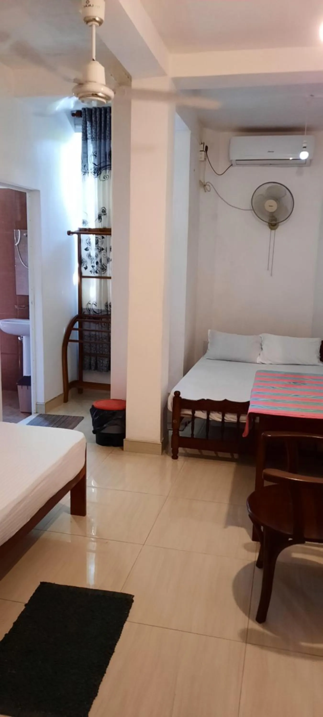 Bed in Polhena Coral Reef Resort