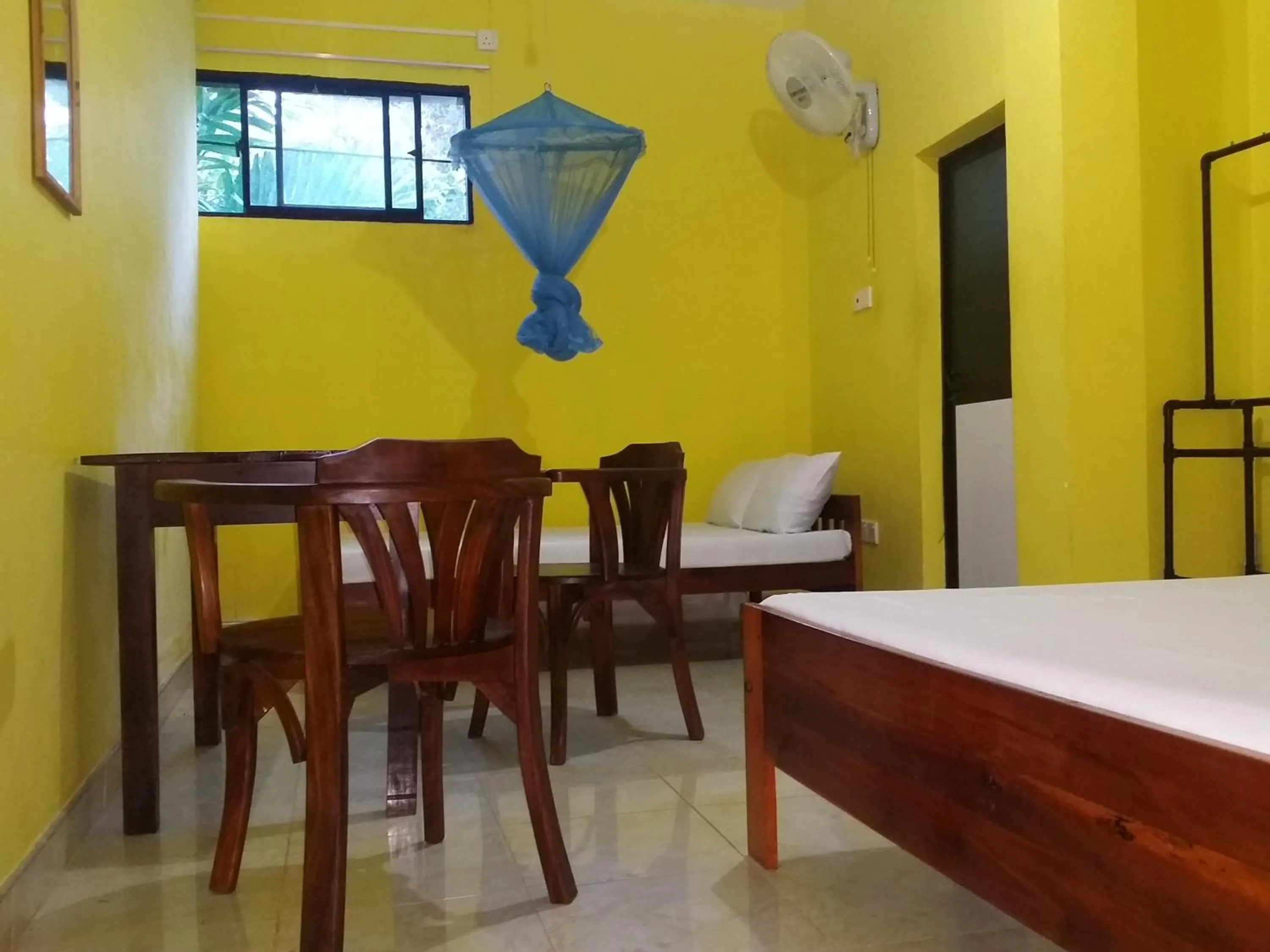 Bed in Polhena Coral Reef Resort