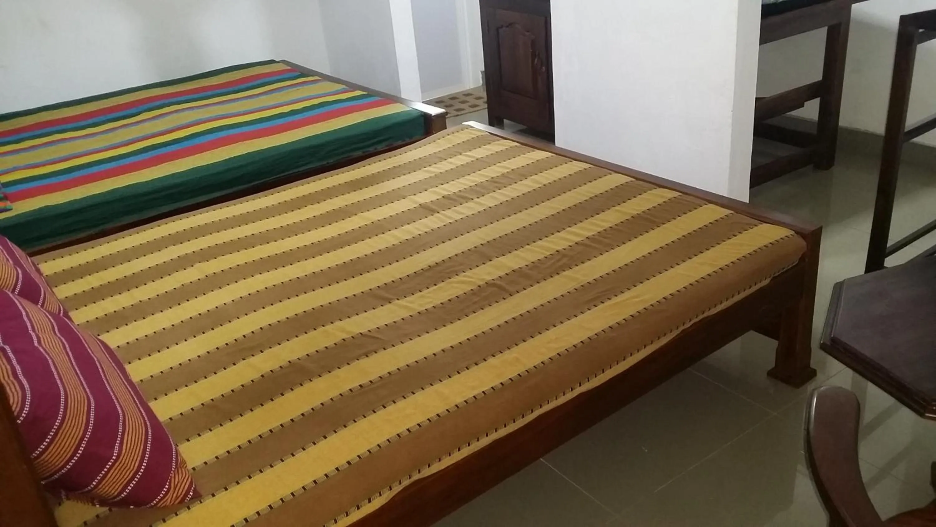 Bed in Polhena Coral Reef Resort