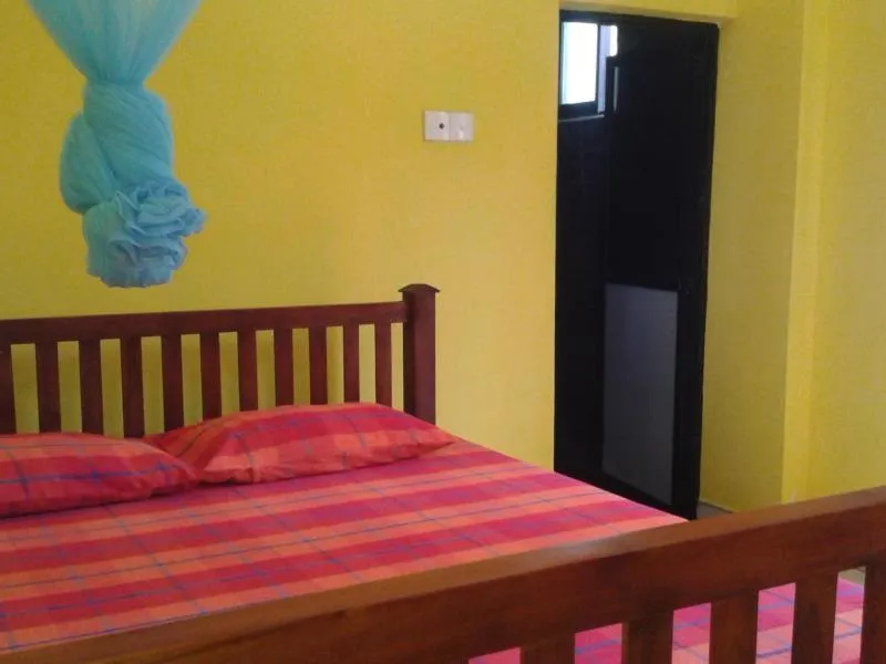 Bed in Polhena Coral Reef Resort