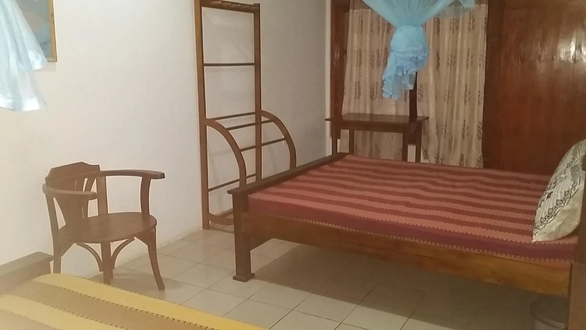 Bed in Polhena Coral Reef Resort