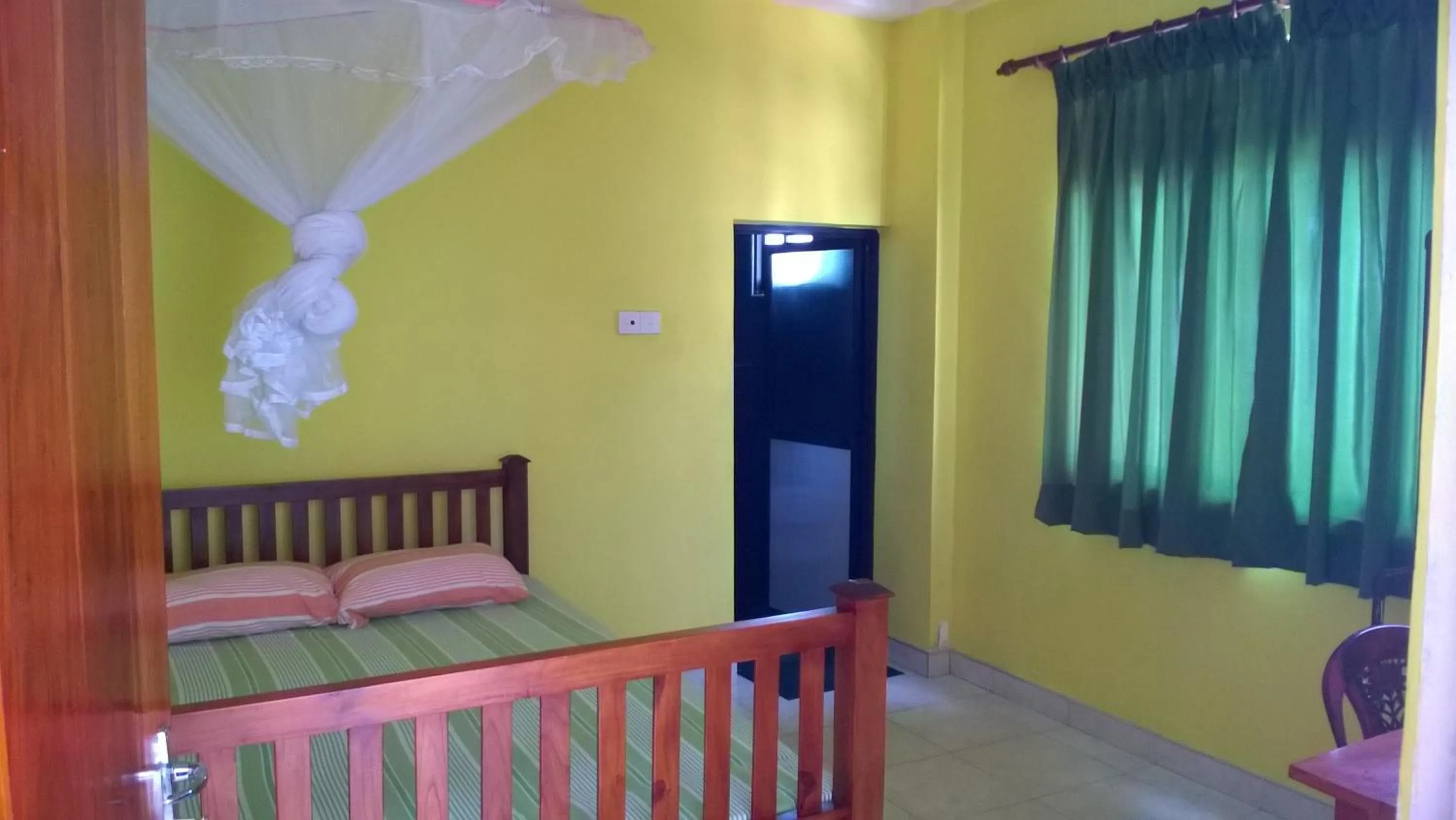 Bed in Polhena Coral Reef Resort