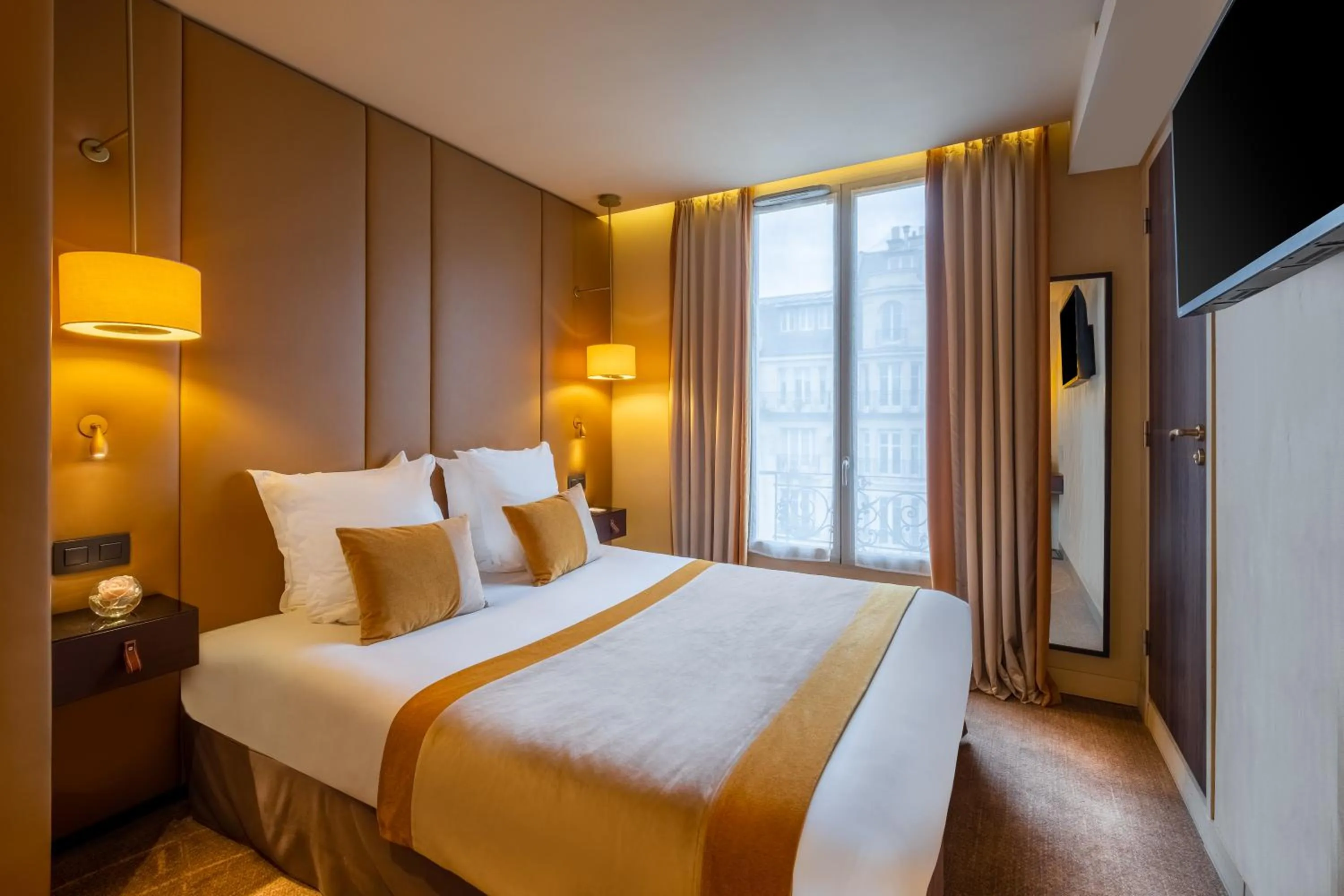 Bed in Hôtel La Bourdonnais by Inwood Hotels