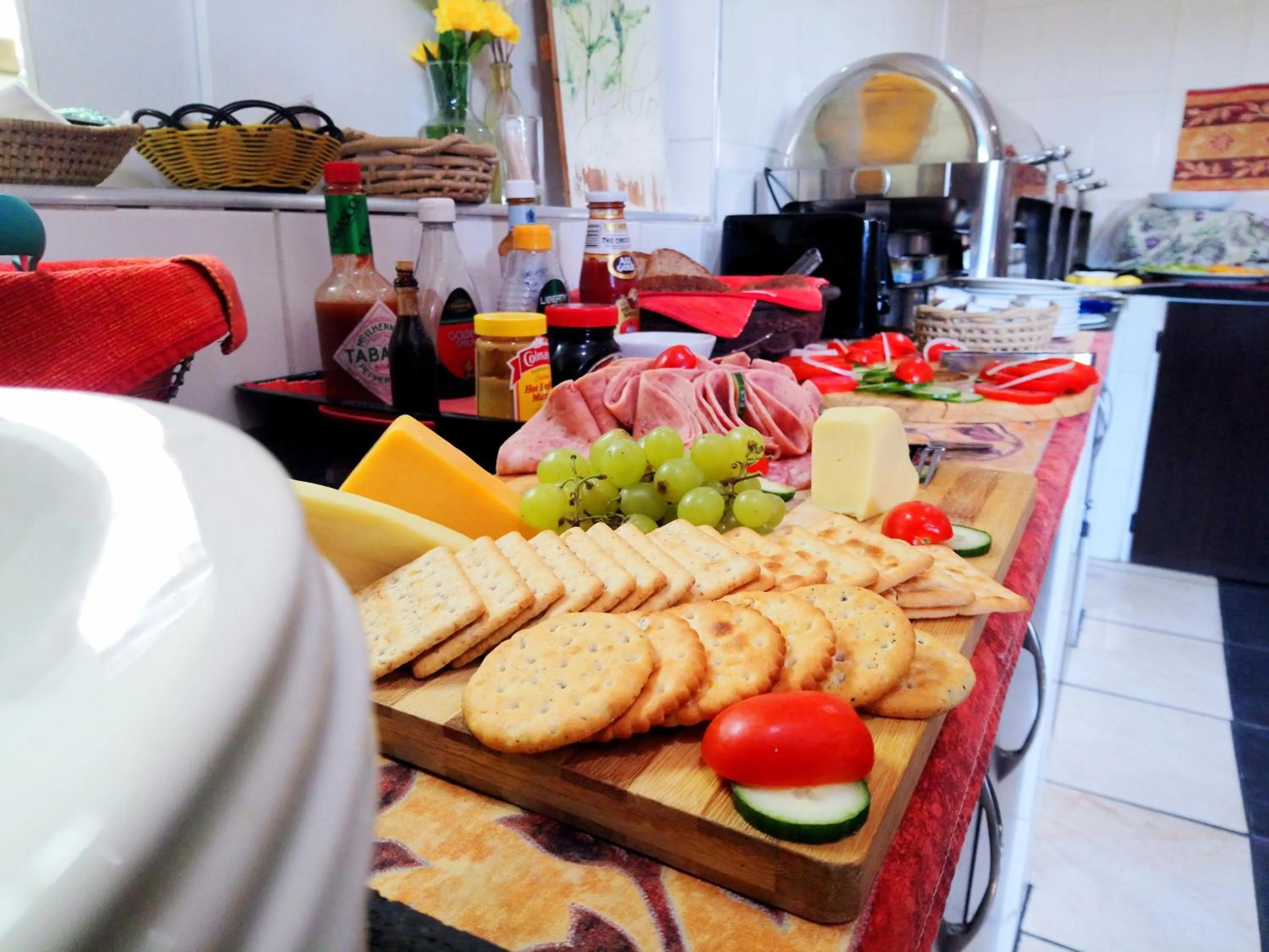 Communal lounge/ TV room in St Lucia Lodge