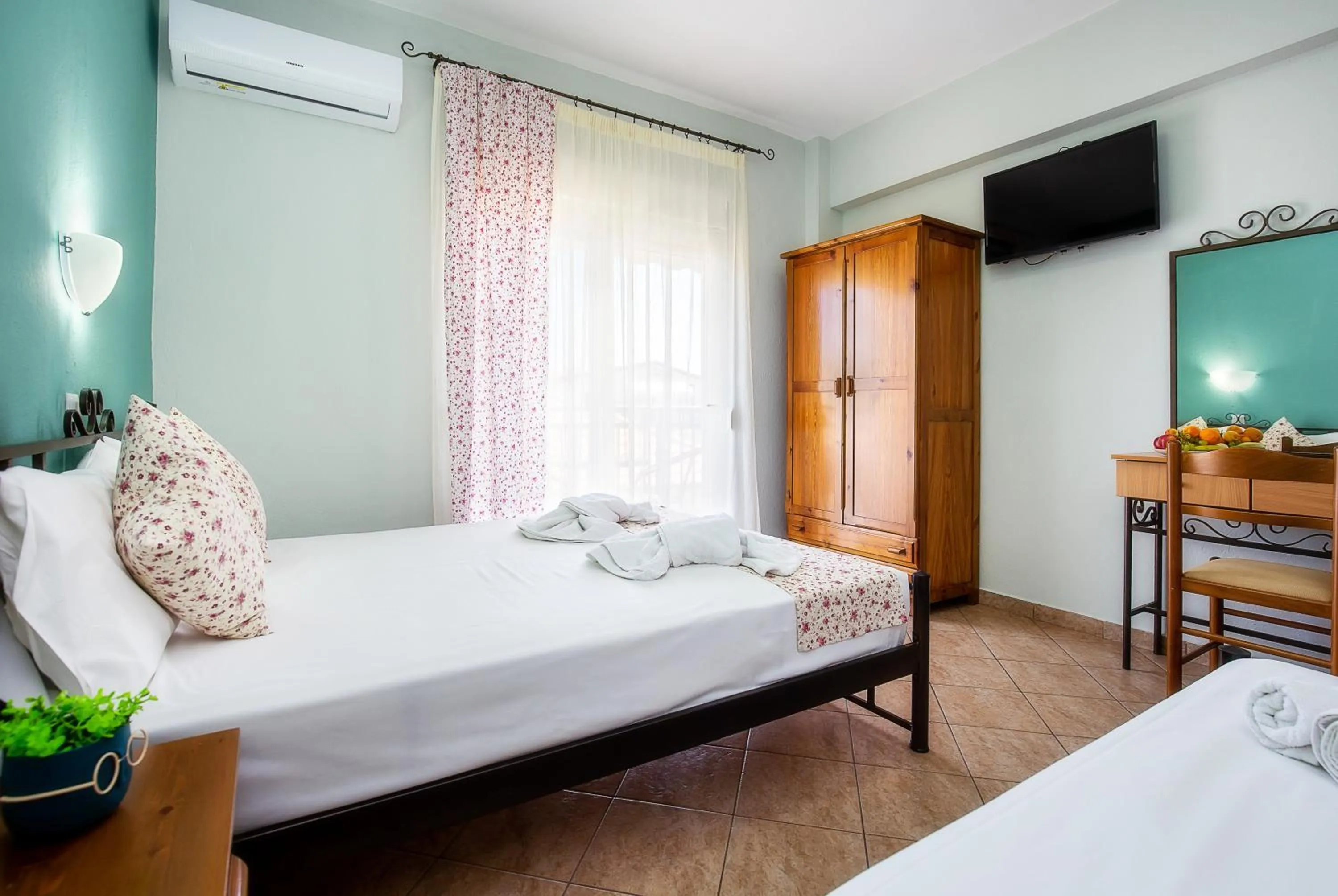 Bed in Famelia Studios Lampiris