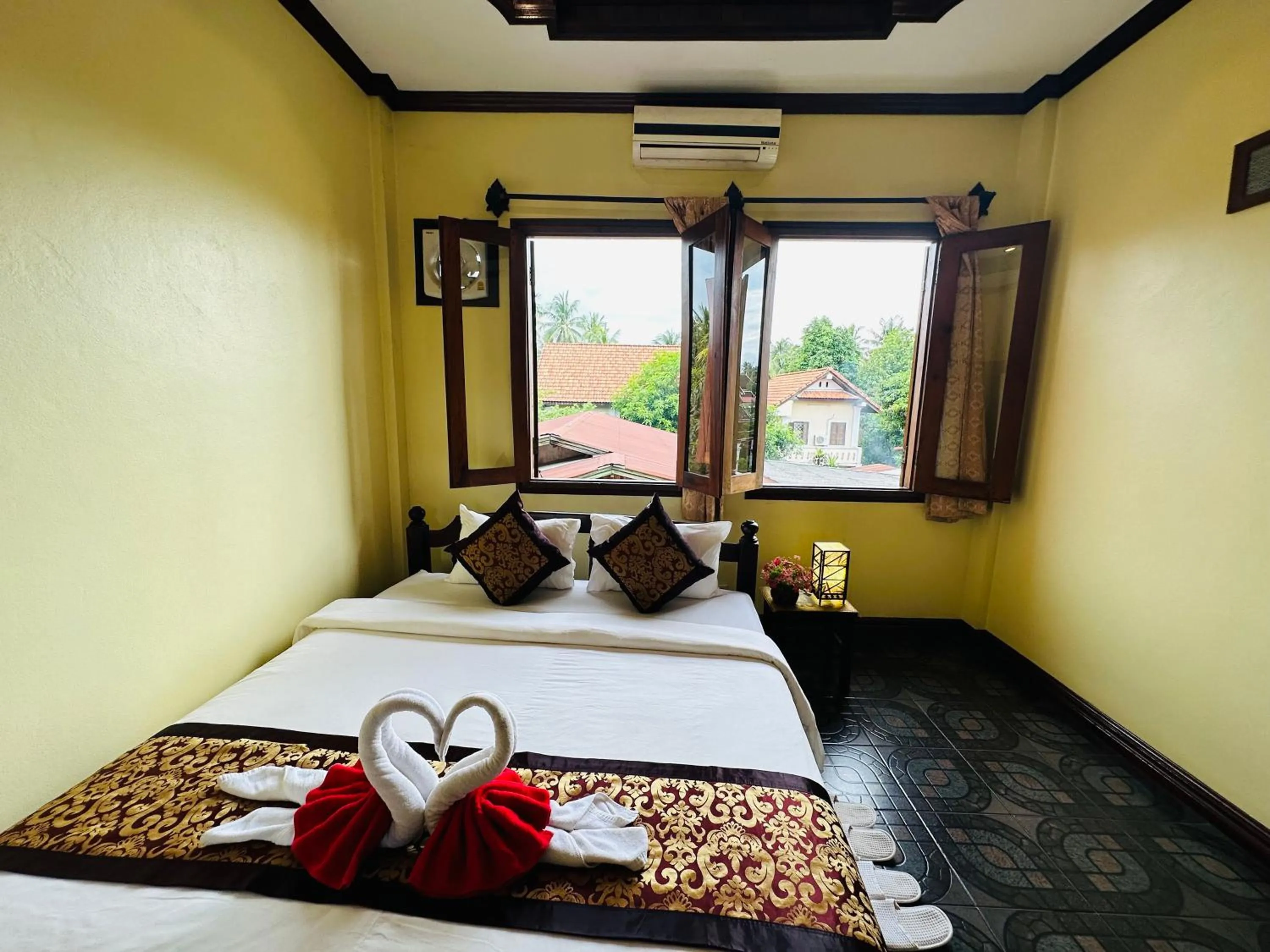 Bed in Visoun Luang Prabang Hotel