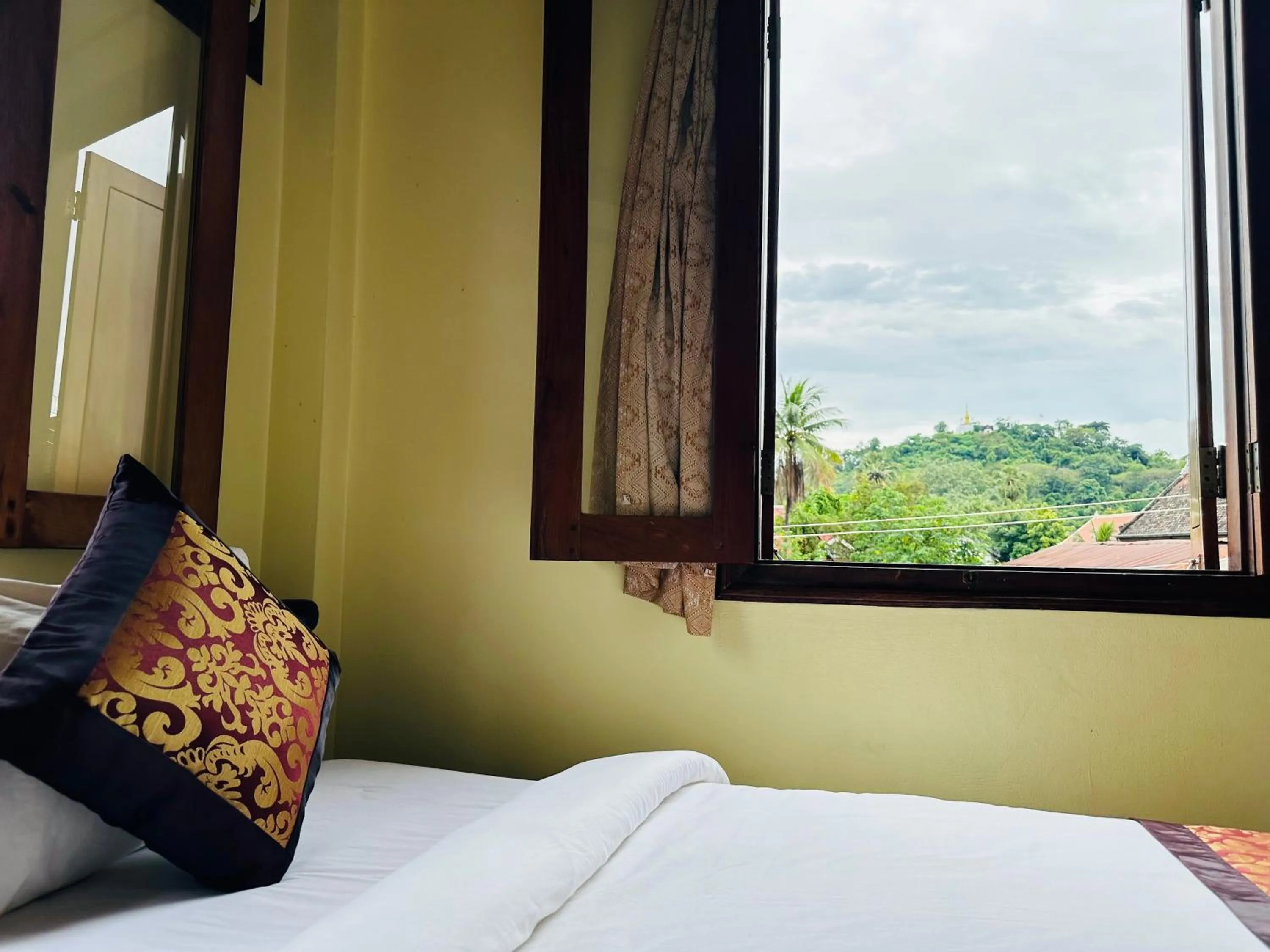 Bed in Visoun Luang Prabang Hotel