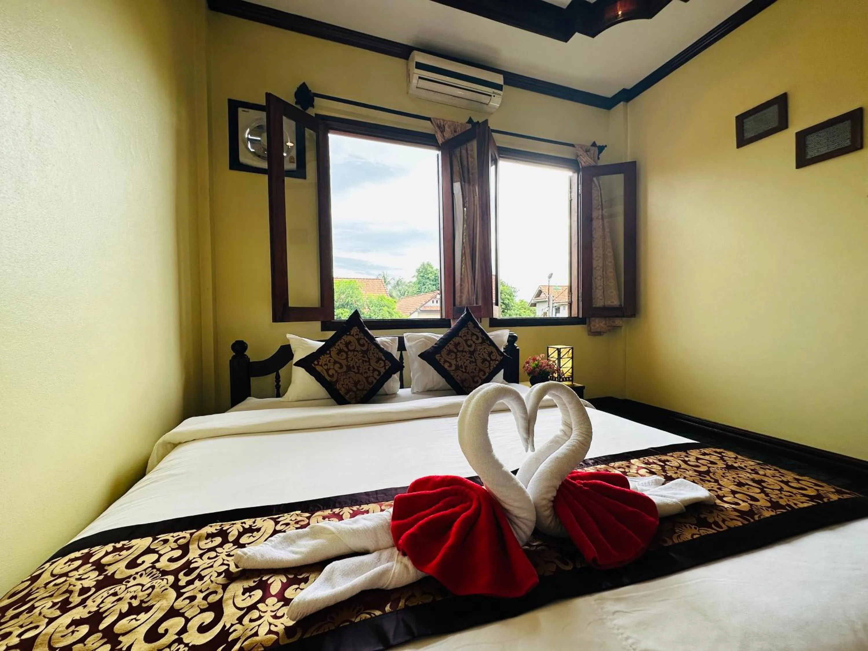 Bed in Visoun Luang Prabang Hotel