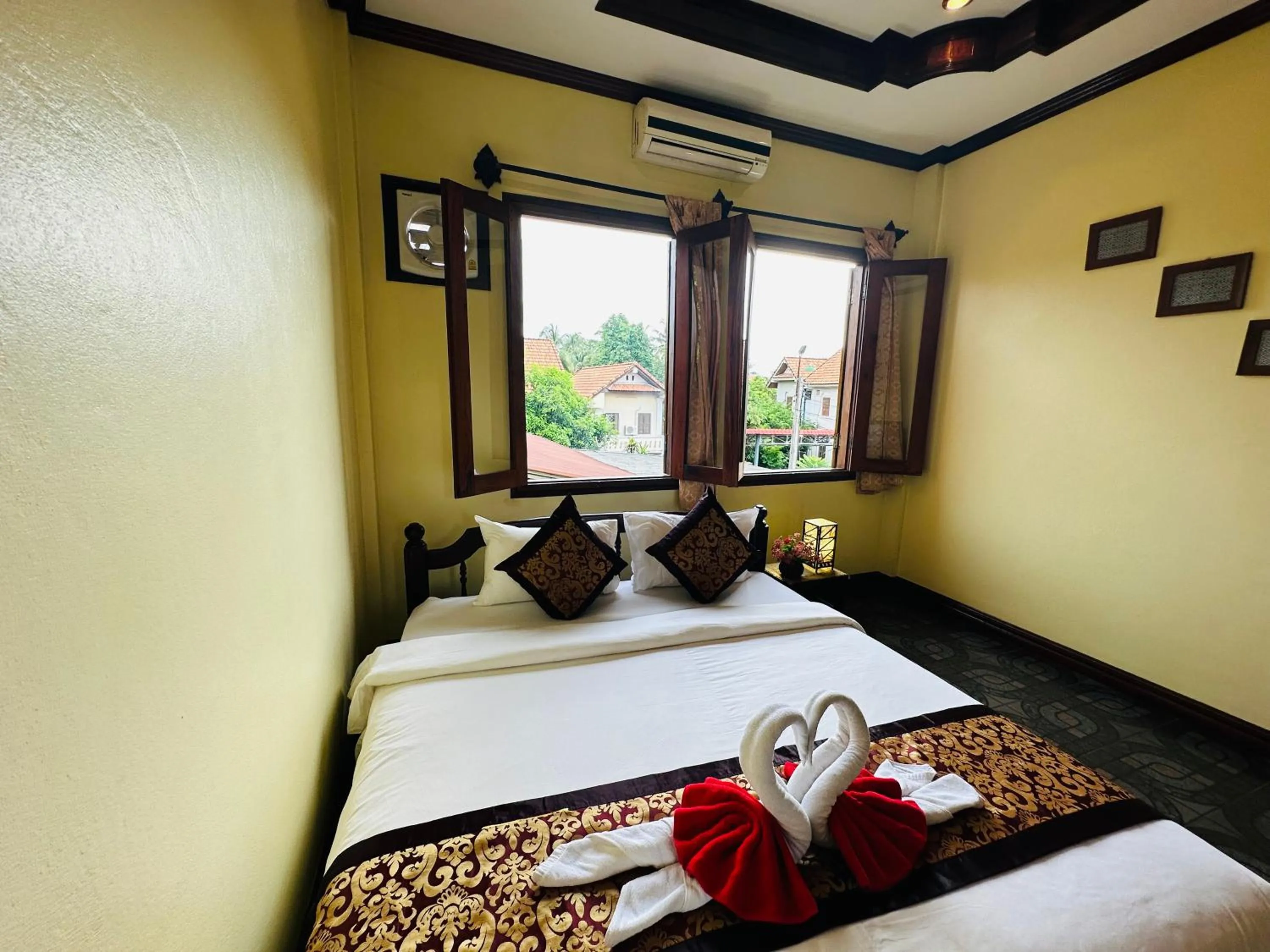 Bed in Visoun Luang Prabang Hotel