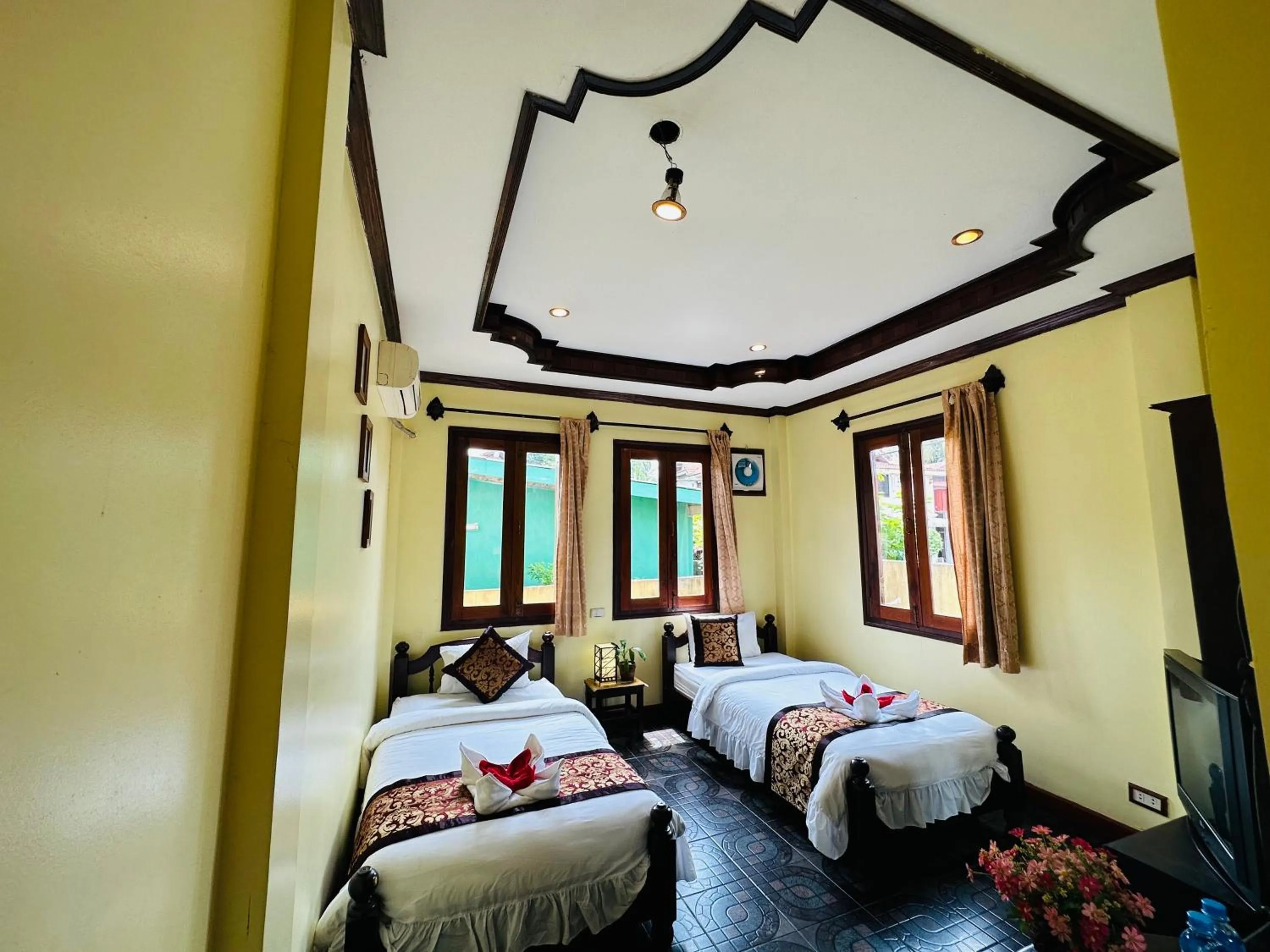 Bed in Visoun Luang Prabang Hotel