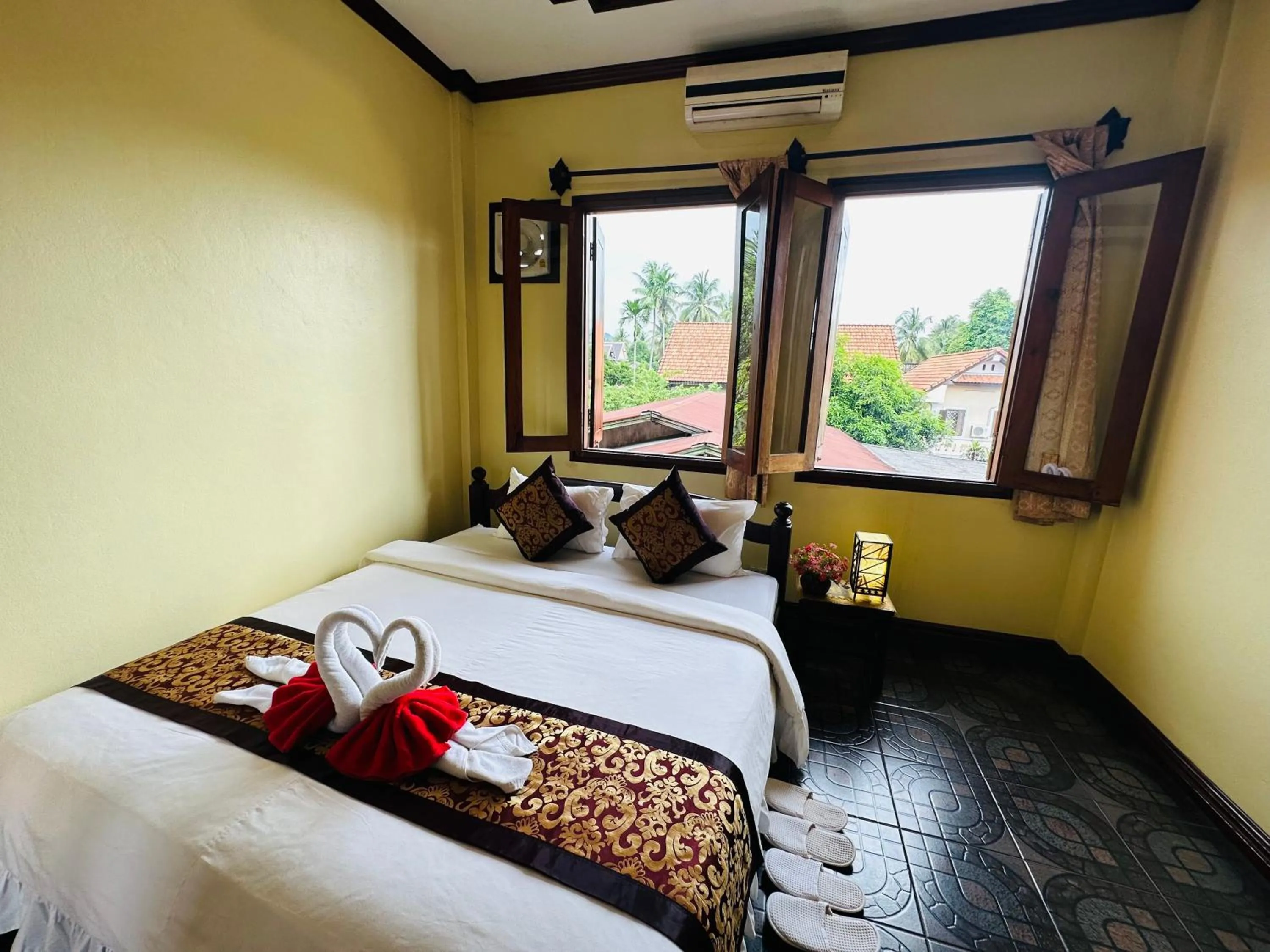 Bed in Visoun Luang Prabang Hotel