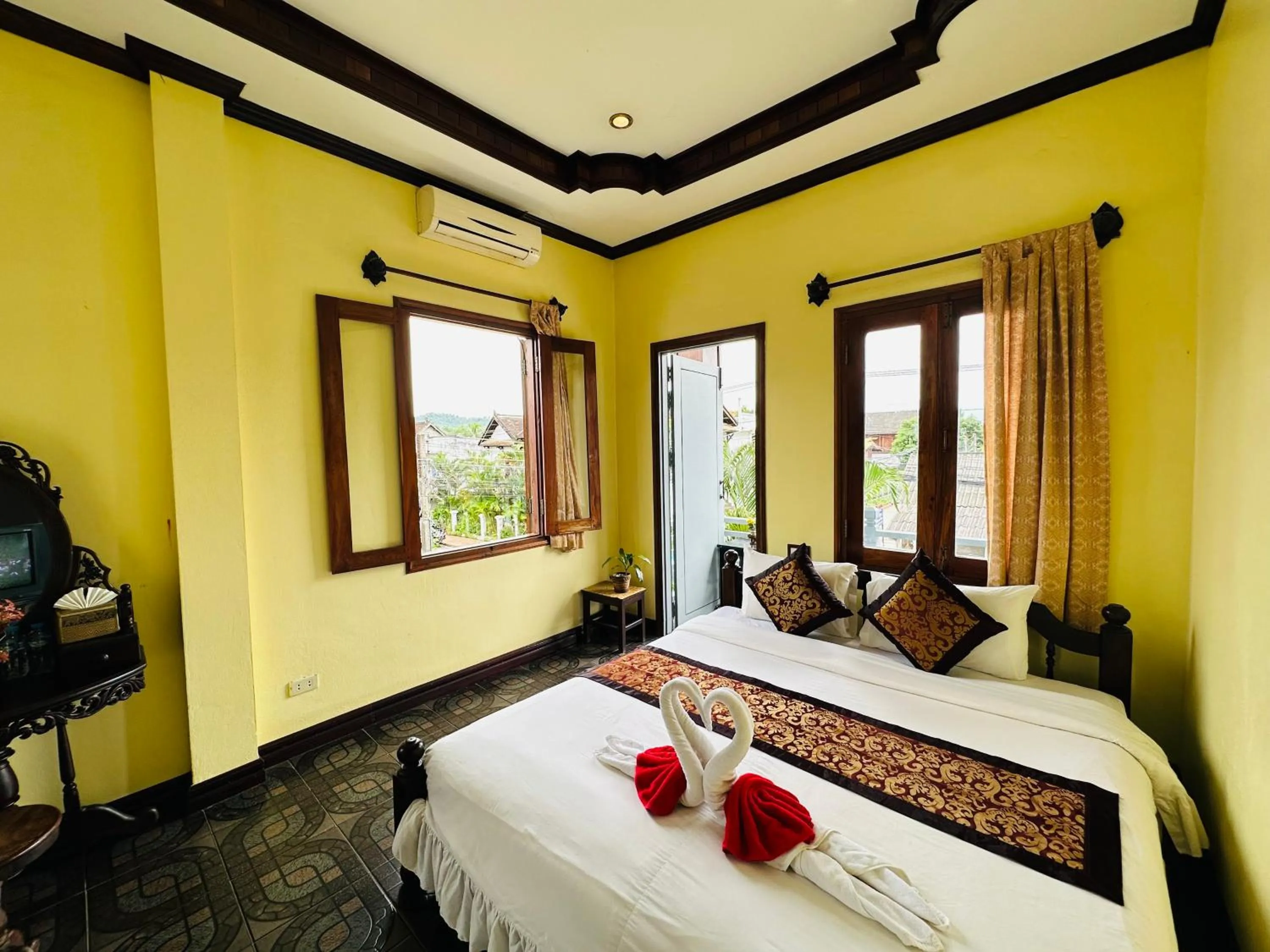 Bed in Visoun Luang Prabang Hotel