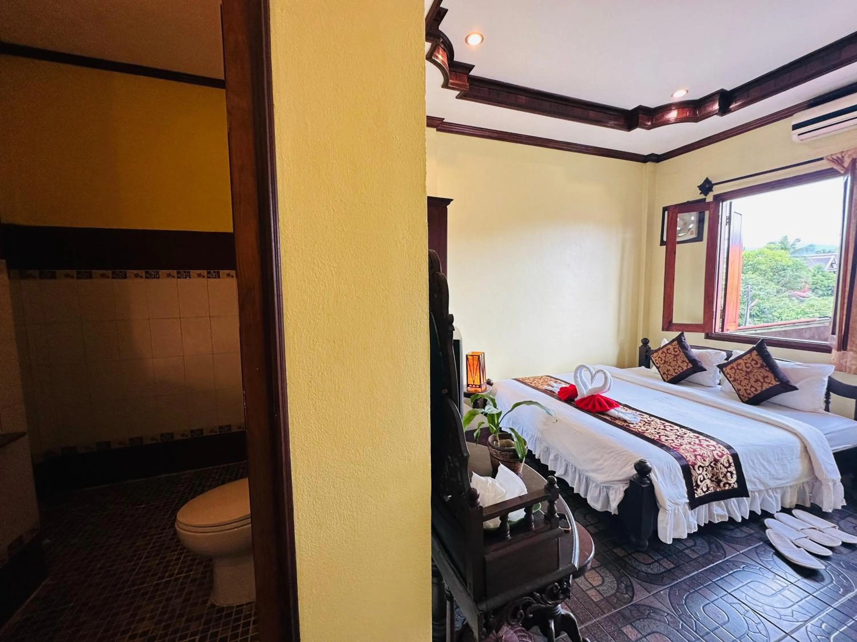 Toilet, Bed in Visoun Luang Prabang Hotel