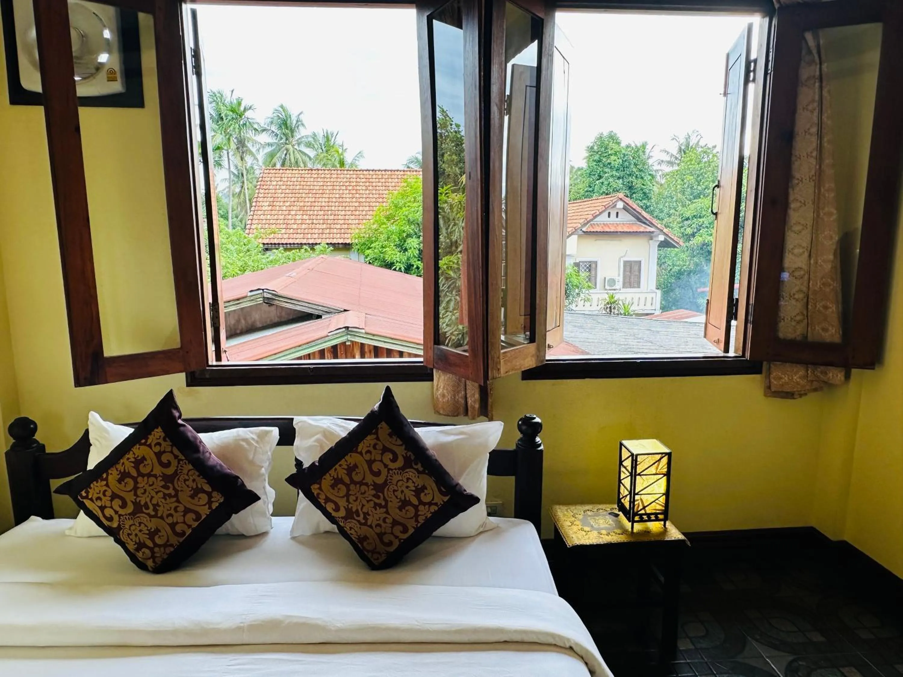 Bed in Visoun Luang Prabang Hotel