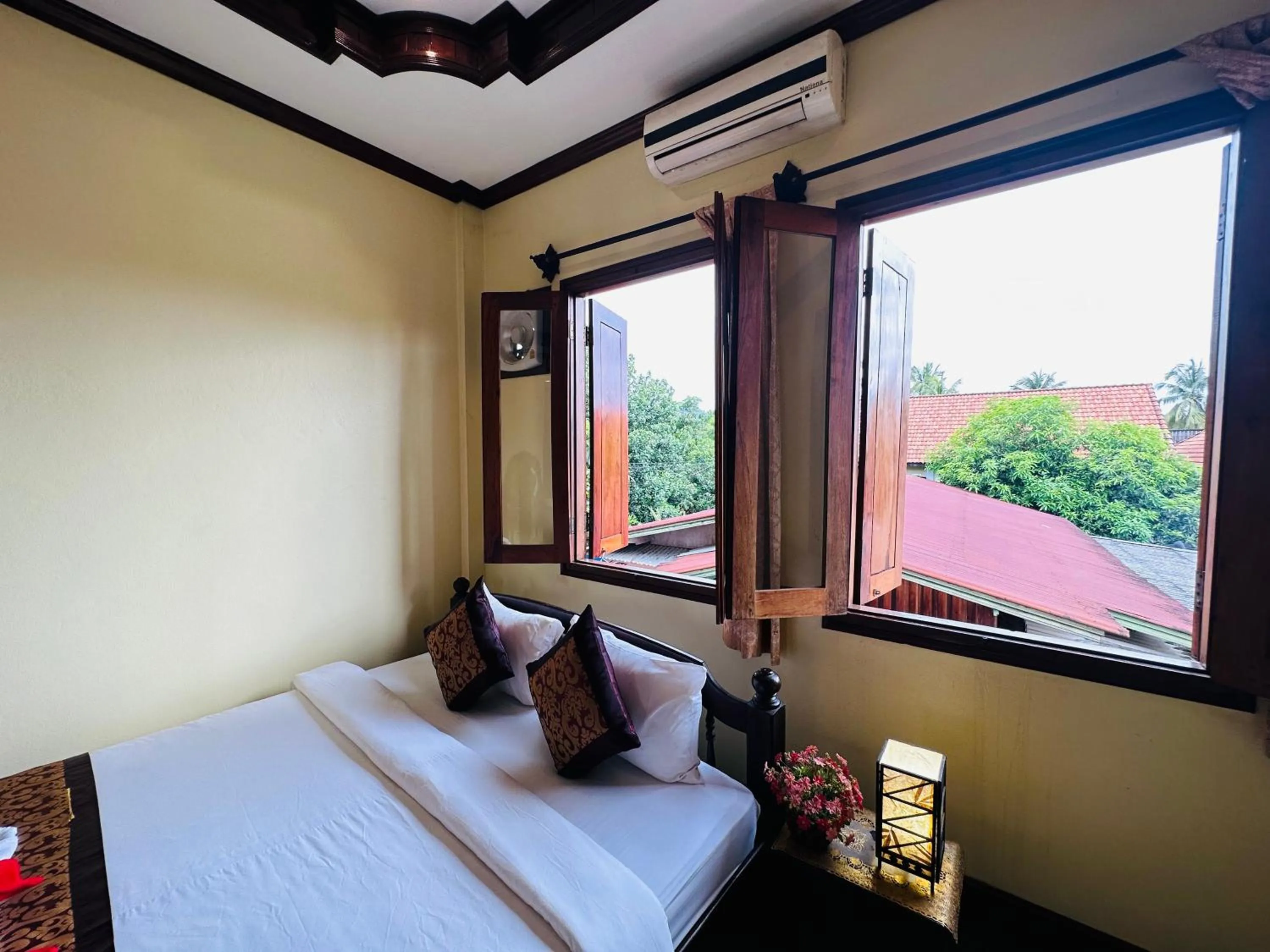 Bed in Visoun Luang Prabang Hotel