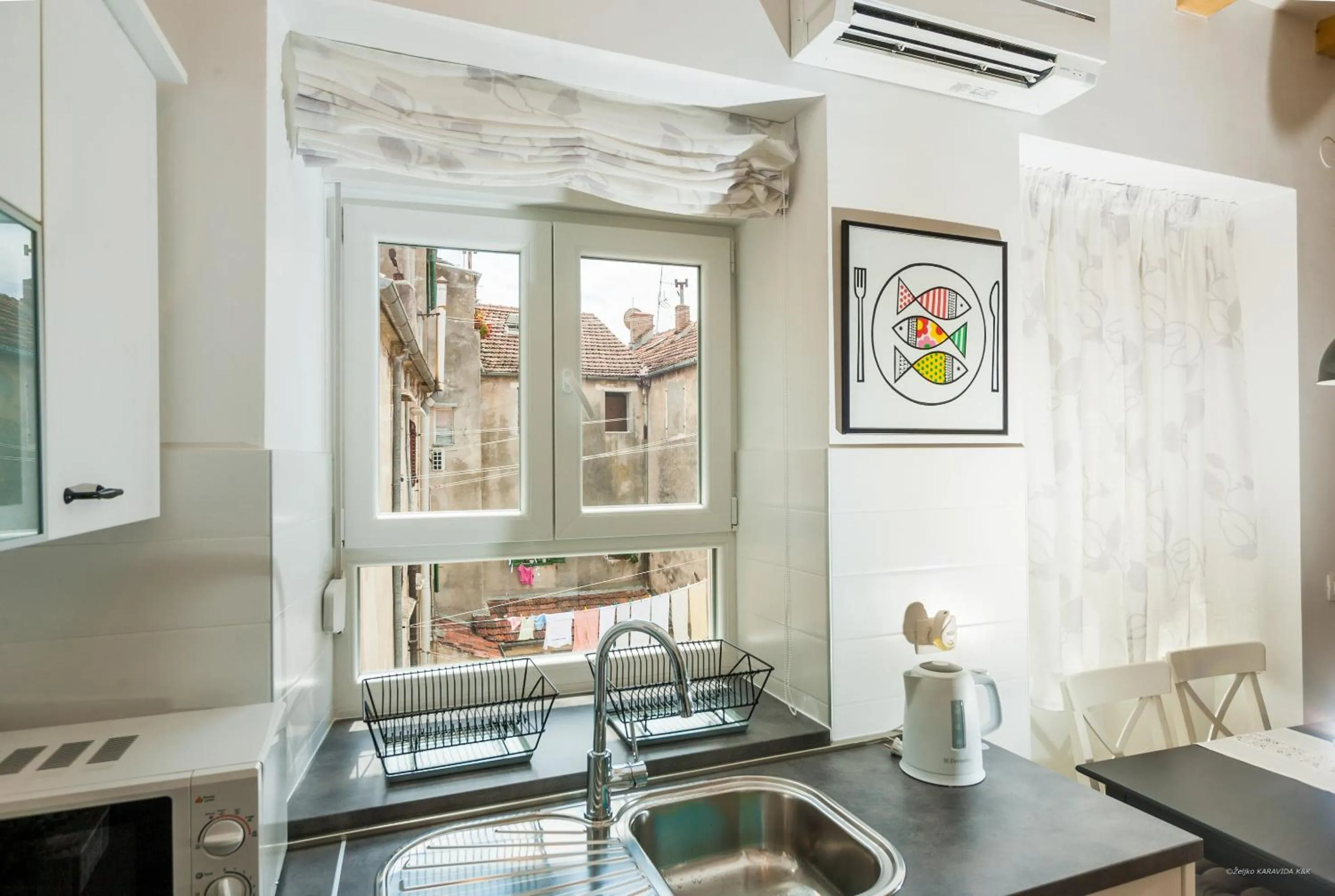 Kitchen or kitchenette in Aldo Apartments Center