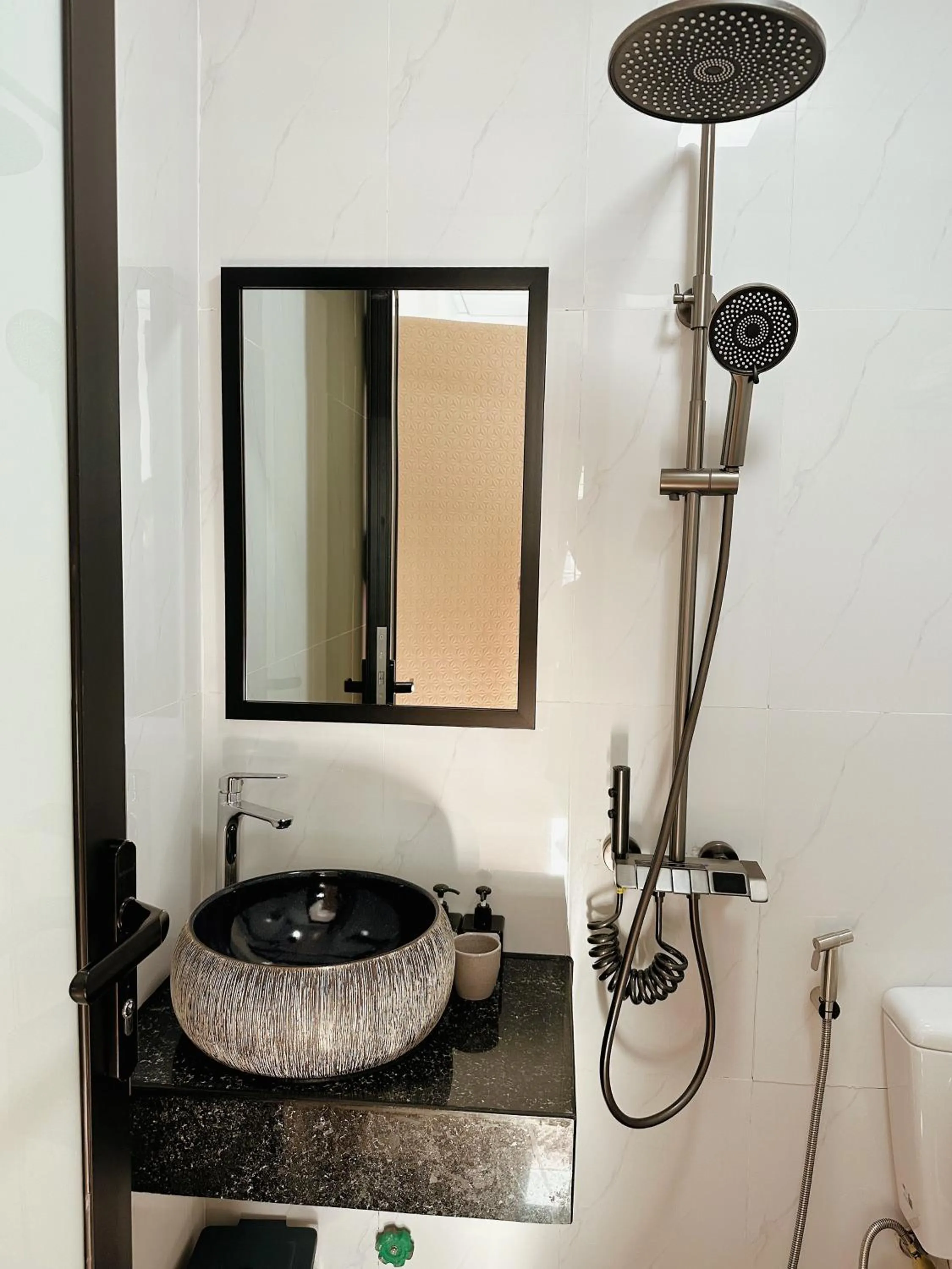 Shower in Under the Sun Homestay